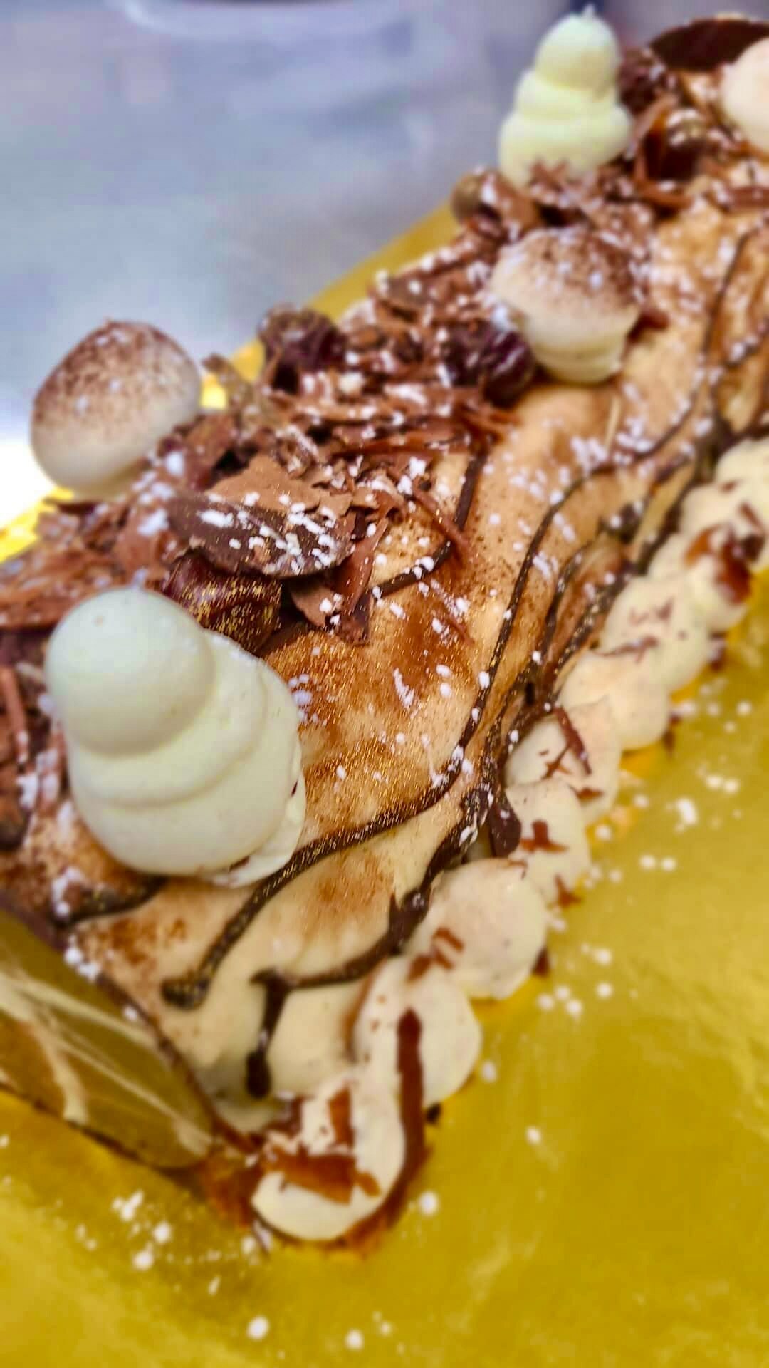 Lulu Kitchen & Bar's house-made Bûche de Noël cake is available for the holiday. CARL TIMPONE