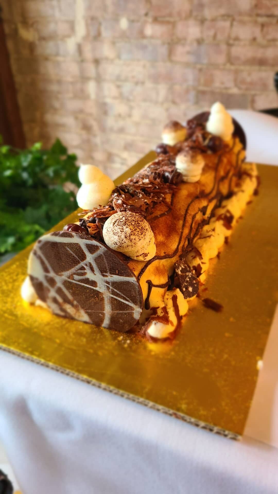 Lulu Kitchen & Bar's house-made Bûche de Noël cake is available for the holiday. CARL TIMPONE