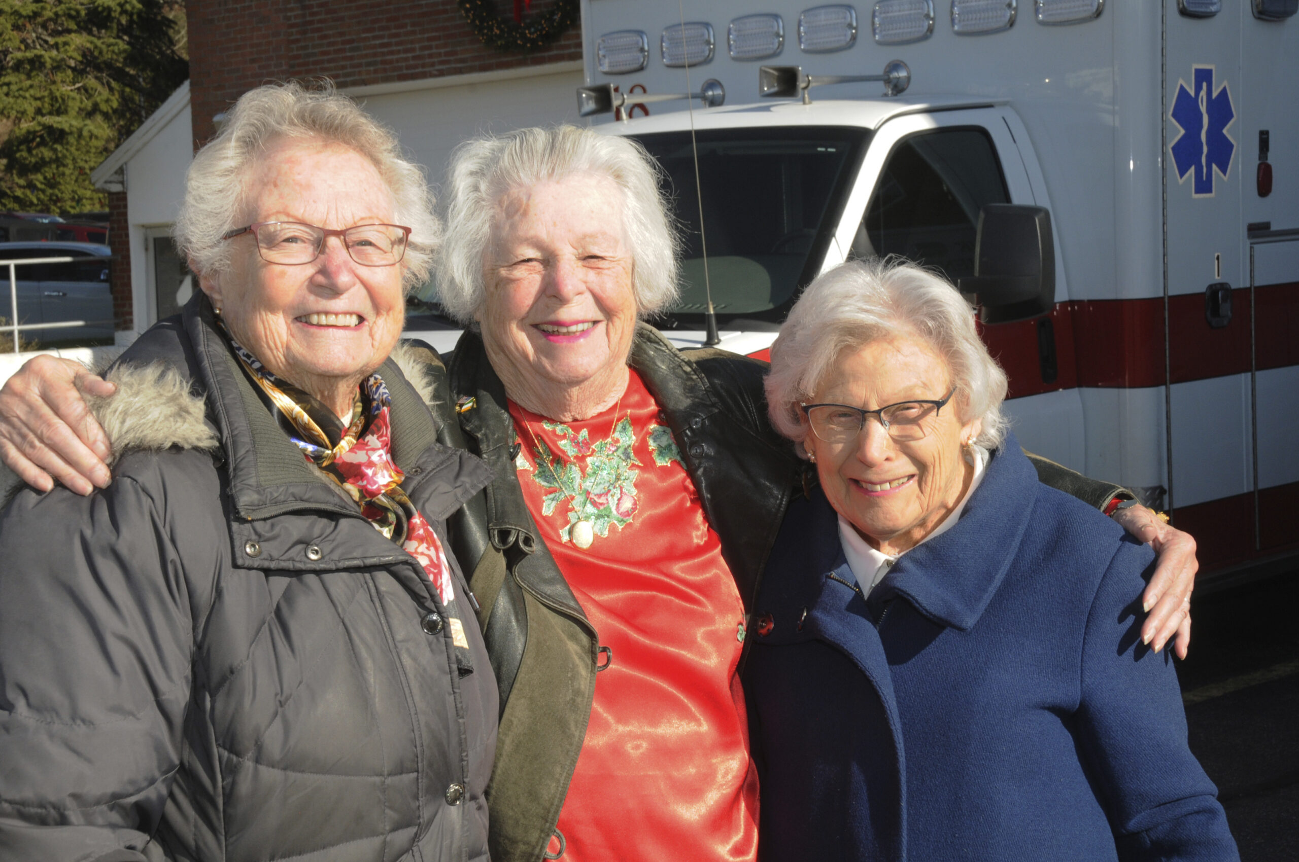 Ann Peterson, June Herlihy and Edna Steck at the Montauk Fire Department's annual dinner for Seniors on Sunday. Equipment bays were cleared out to make room for festive dinner tables. MFD volunteers handed out 
