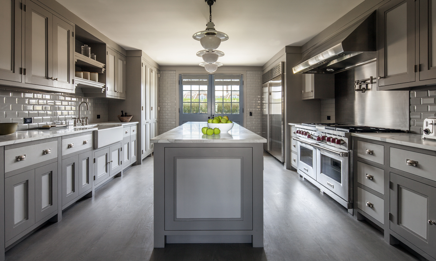 Gas stoves, like the high-end version featured in this kitchen, could become a thing of the past if new regulations ban the use of fossil fuel appliances in new construction in a few years. COURTESY MICHAEL DAVIS DESIGN AND CONSTRUCTION