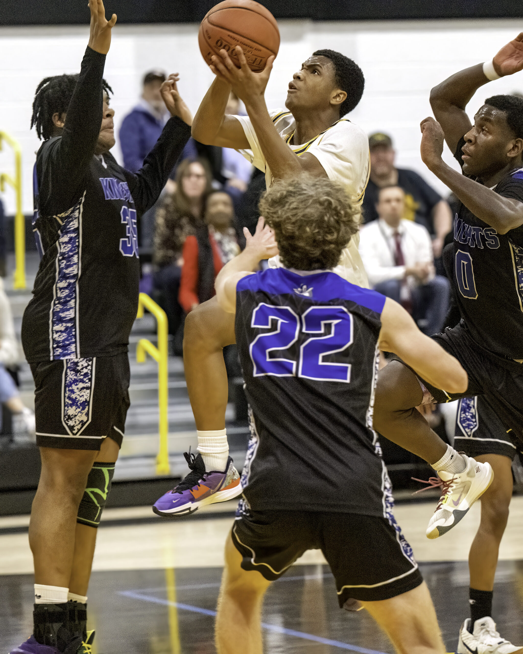 Freshman guard Sae'vion Ward shoots through traffic. MARIANNE BARNETT