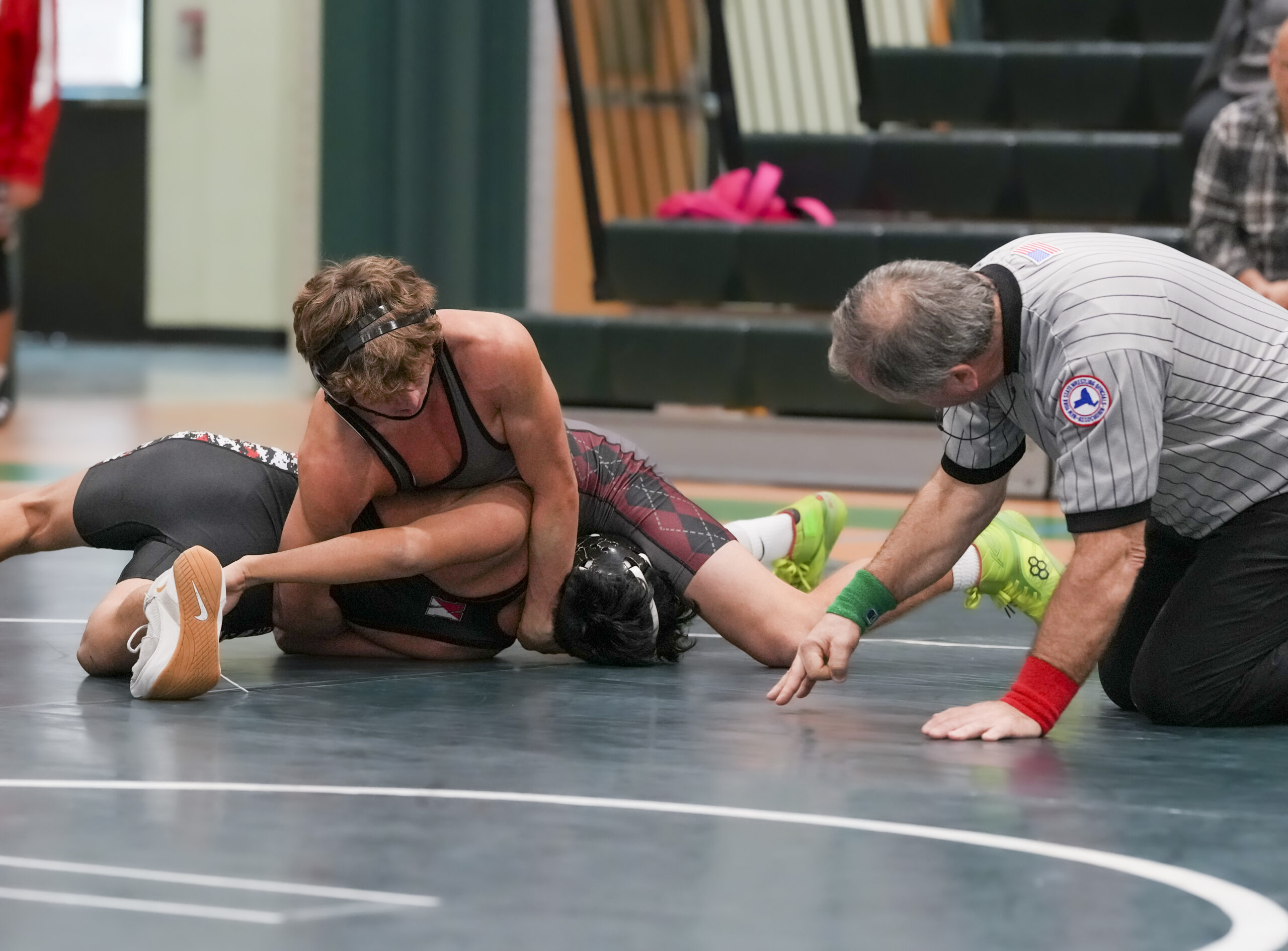 Luke Castillo scores three back points and works on a pin at the Cory Hubbard Duals on Saturday.   RON ESPOSITO
