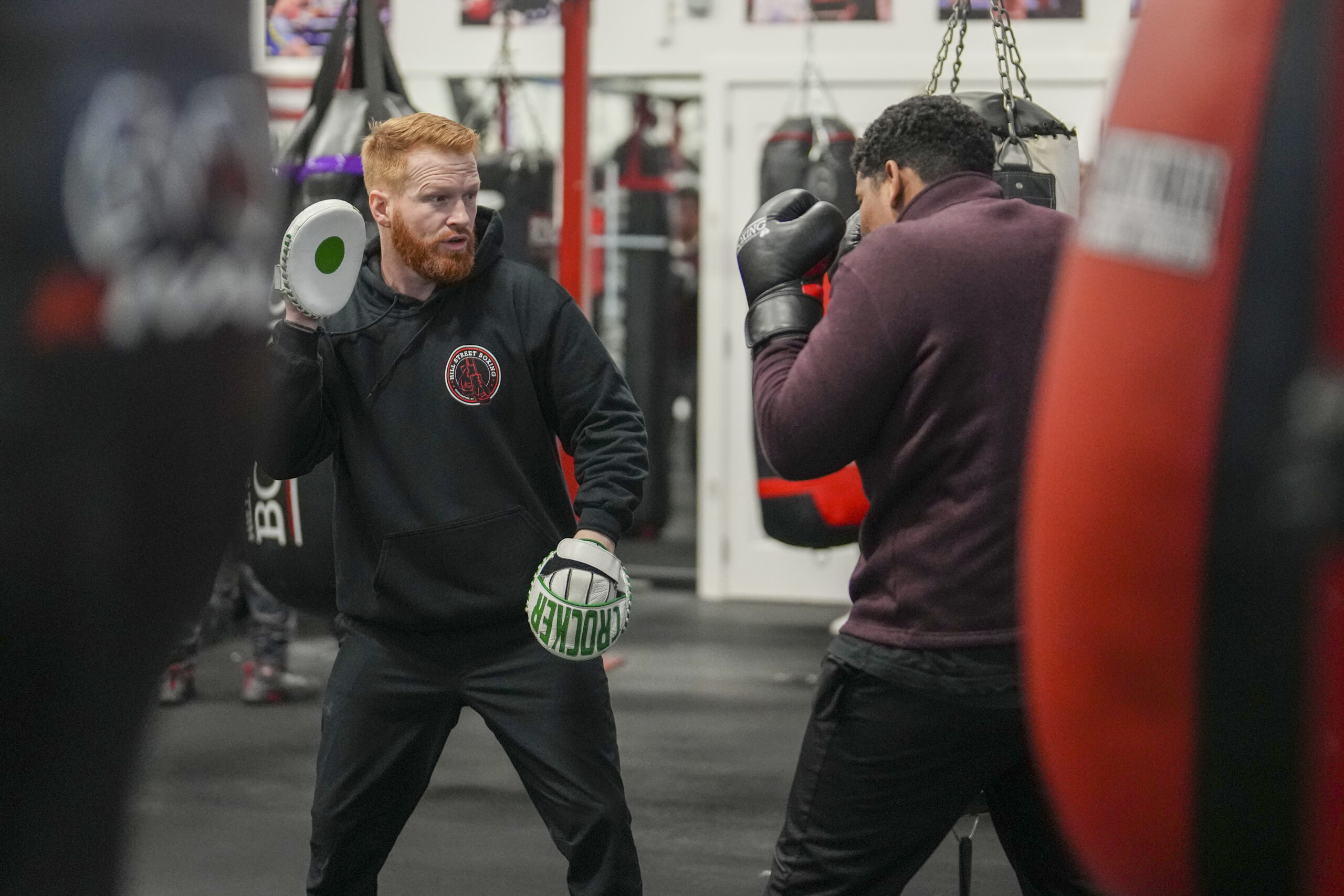 Avery Crocker leads a boxing class.    RON ESPOSITO