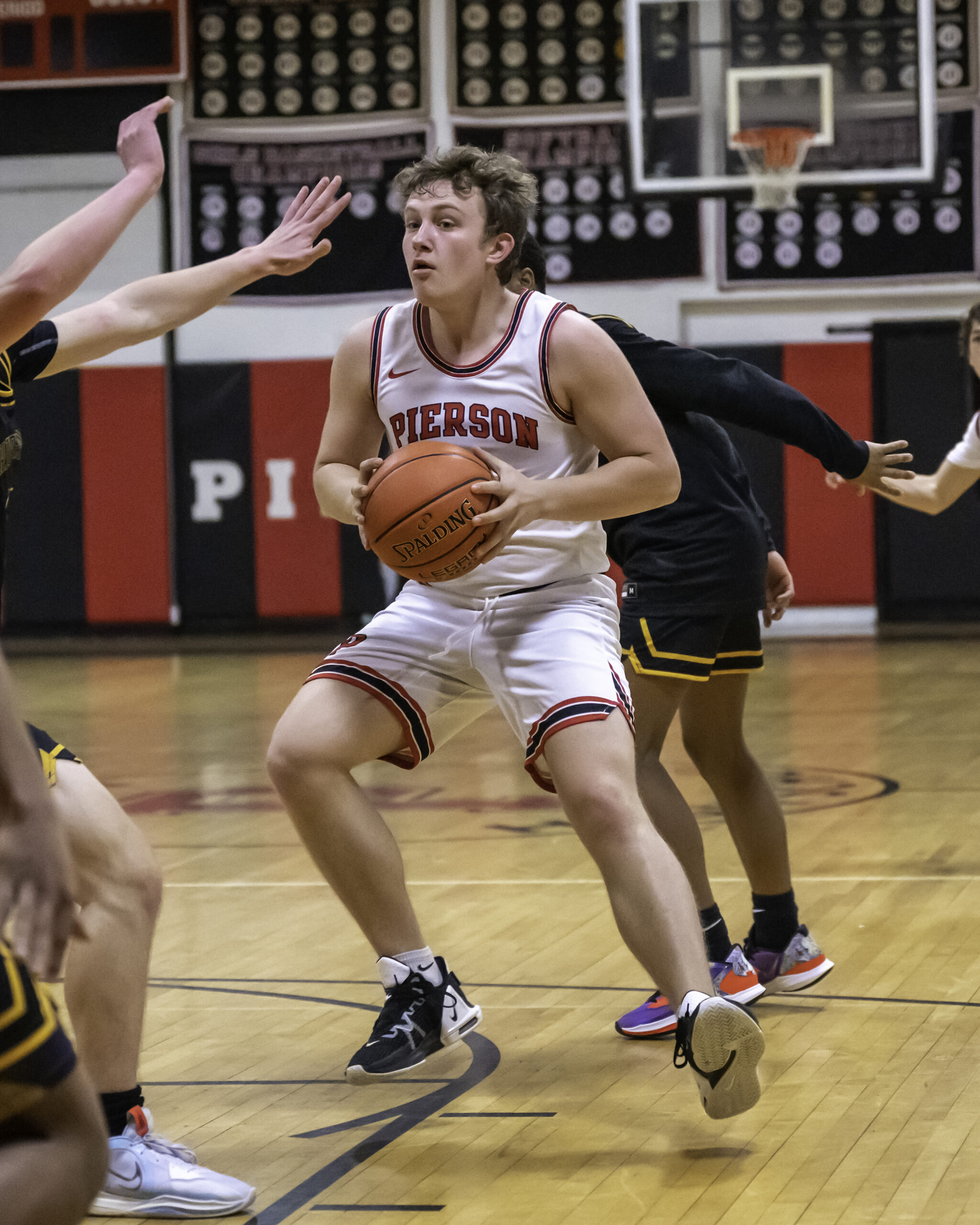 Pierson senior Logan Hartstein looks for an opening on the court.    MARIANNE BARNETT