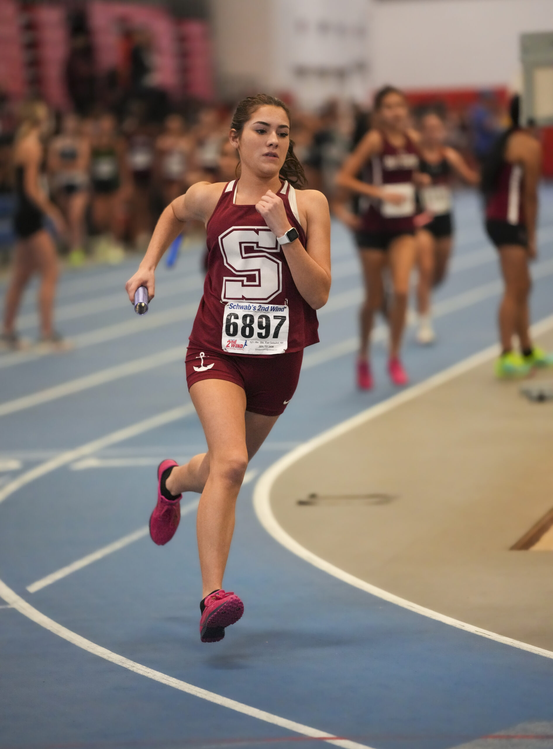 Melanie Lepez running in the 4x200-meter relay for Southampton.   RON ESPOSITO