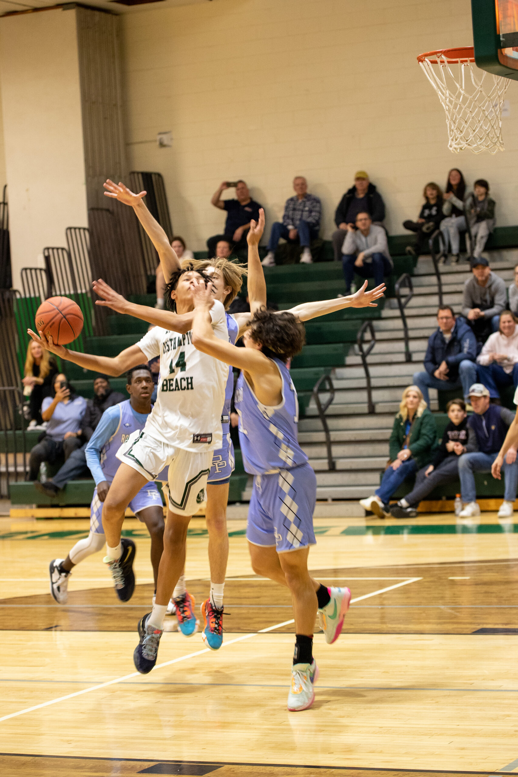 Westhampton Beach sophomore Jorden Bennett draws a foul late in the game.   MICHAEL O'CONNOR