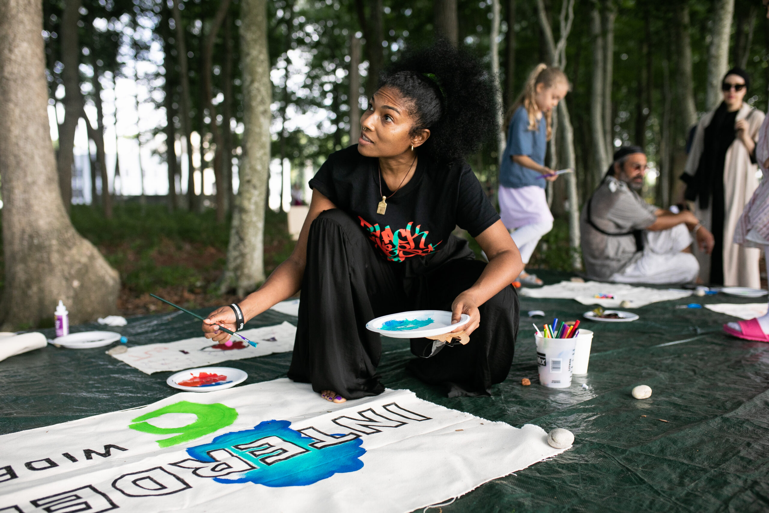 Using art to explore issues related to activism, the Watermill Center will offer a five-week program for teens. Artists engaged with visitors during a previous Community Day event. COURTESY THE WATERMILL CENTER