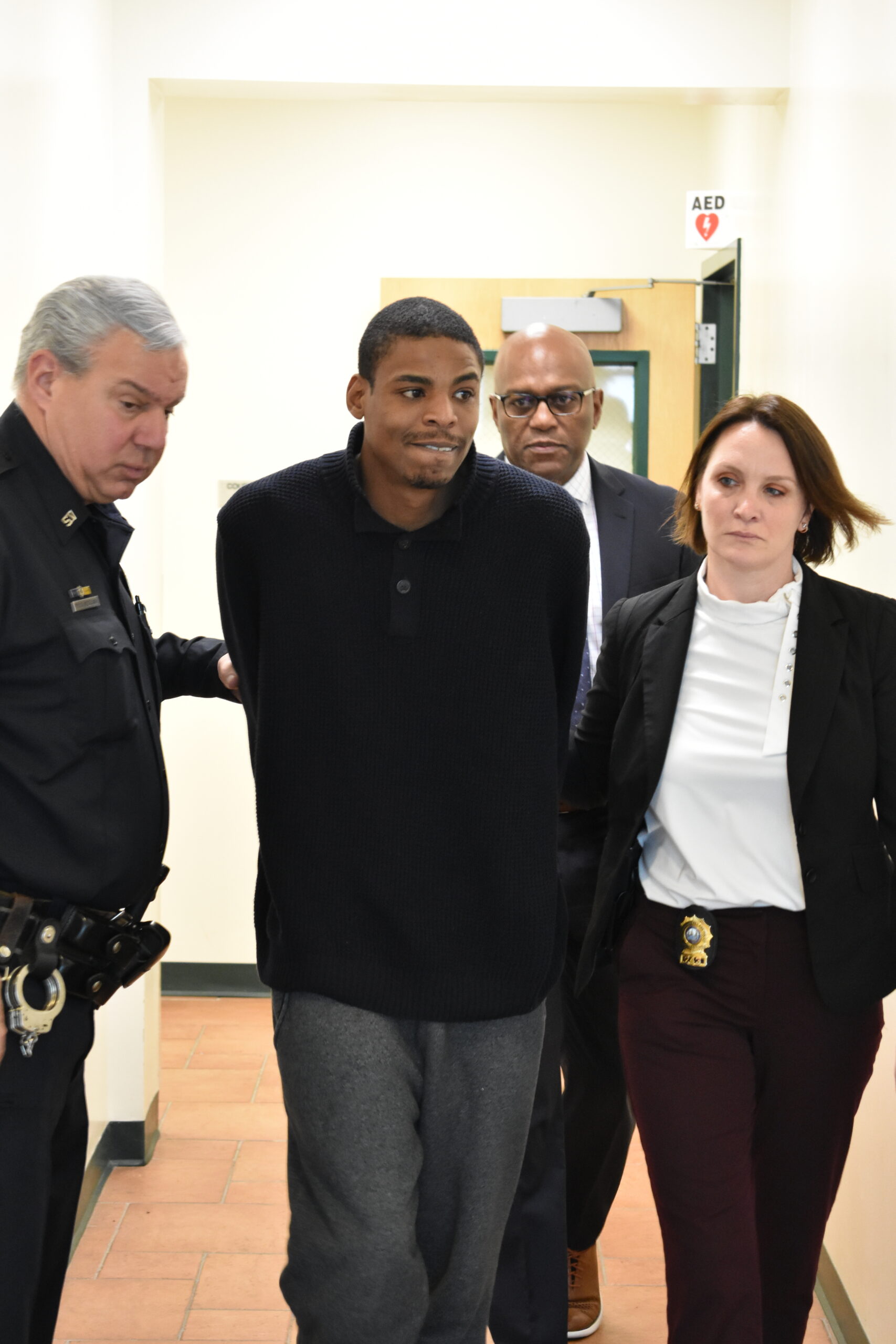 Isaiah Q. James is led into the courtroom at the Southampton Village Justice Center on Friday, January 6.  BRENDAN J. O'REILLY