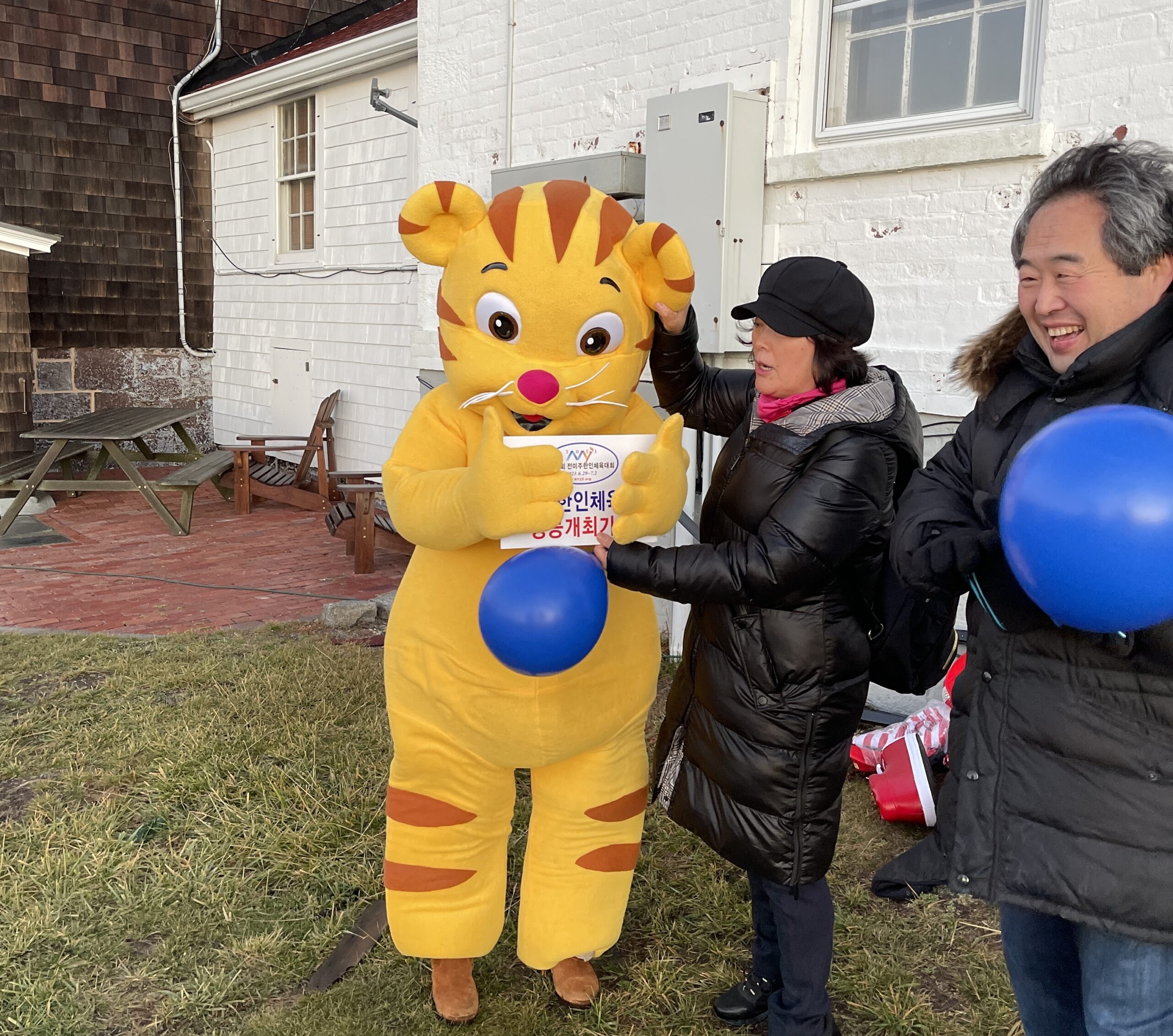 Arriving with the event's mascot, organizers promoted the Korean American Sports Festival, slated for this summer in Nassau County.    KATHERINE C.H.E.