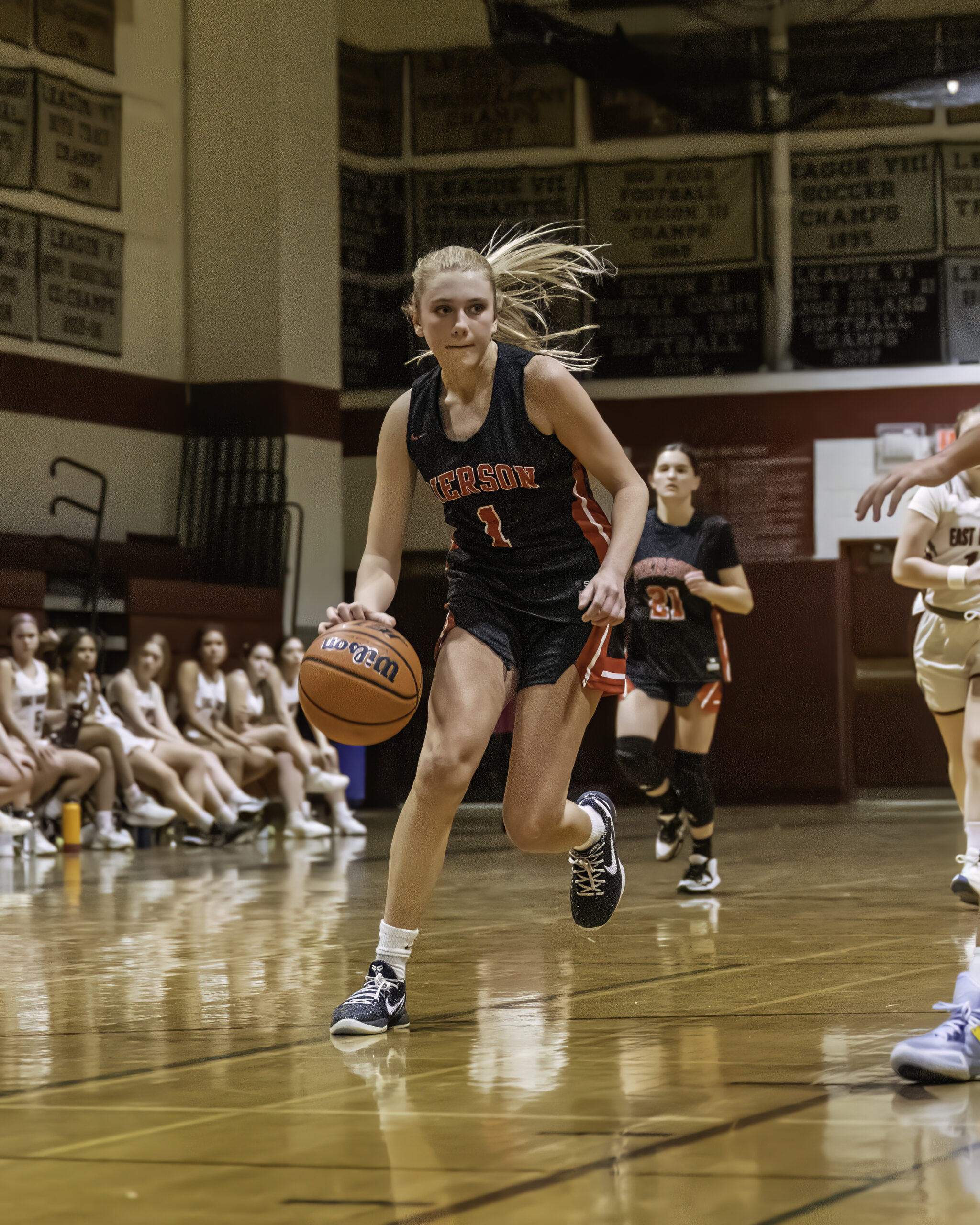 Pierson's Coco Lohmiller dribbles the ball up the court.   MARIANNE BARNETT