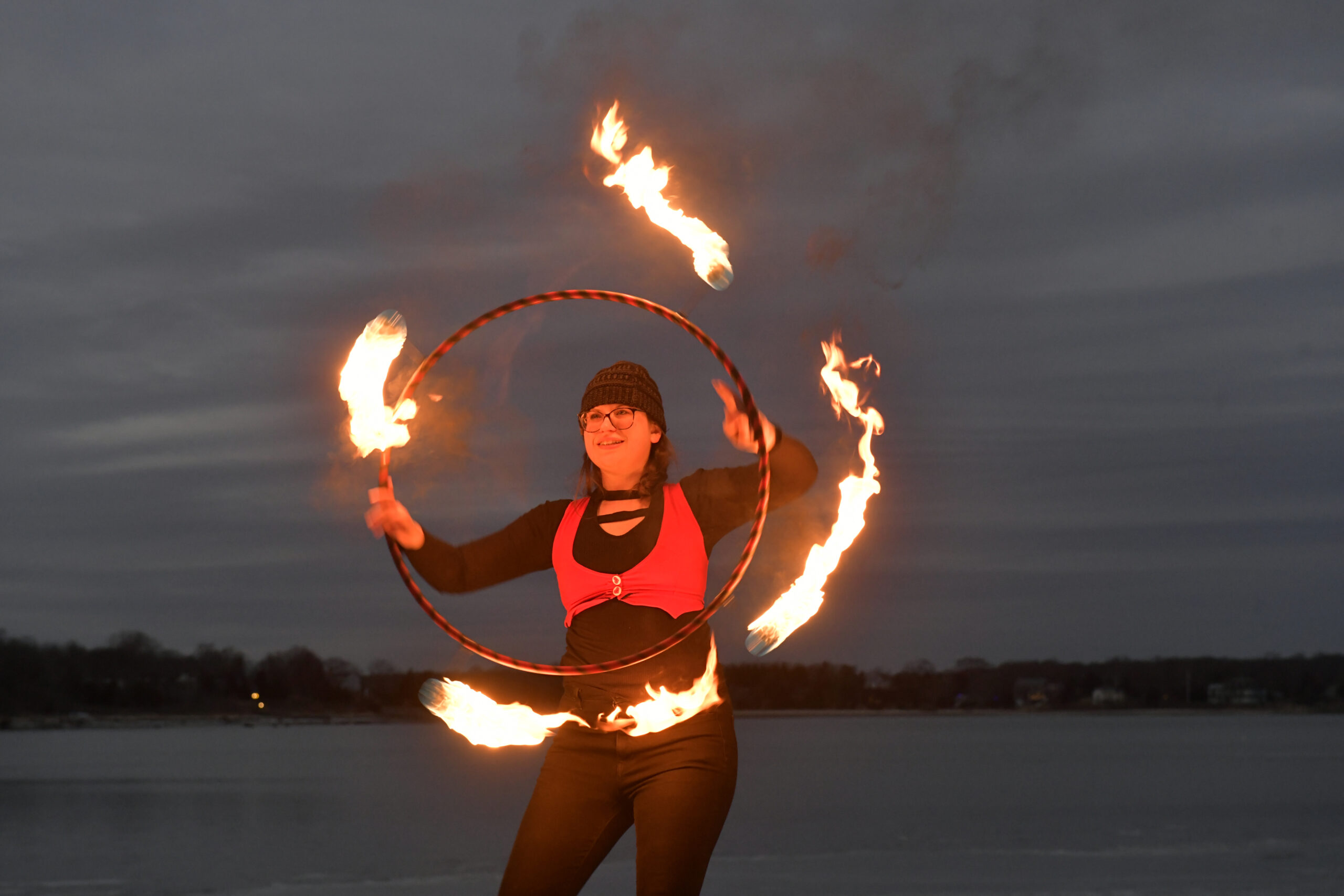 Heather Rosengarten performs during Fire Dancing by Keith Leaf and His Flaming Friends at Windmill Beach on Saturday evening.   DANA SHAW
