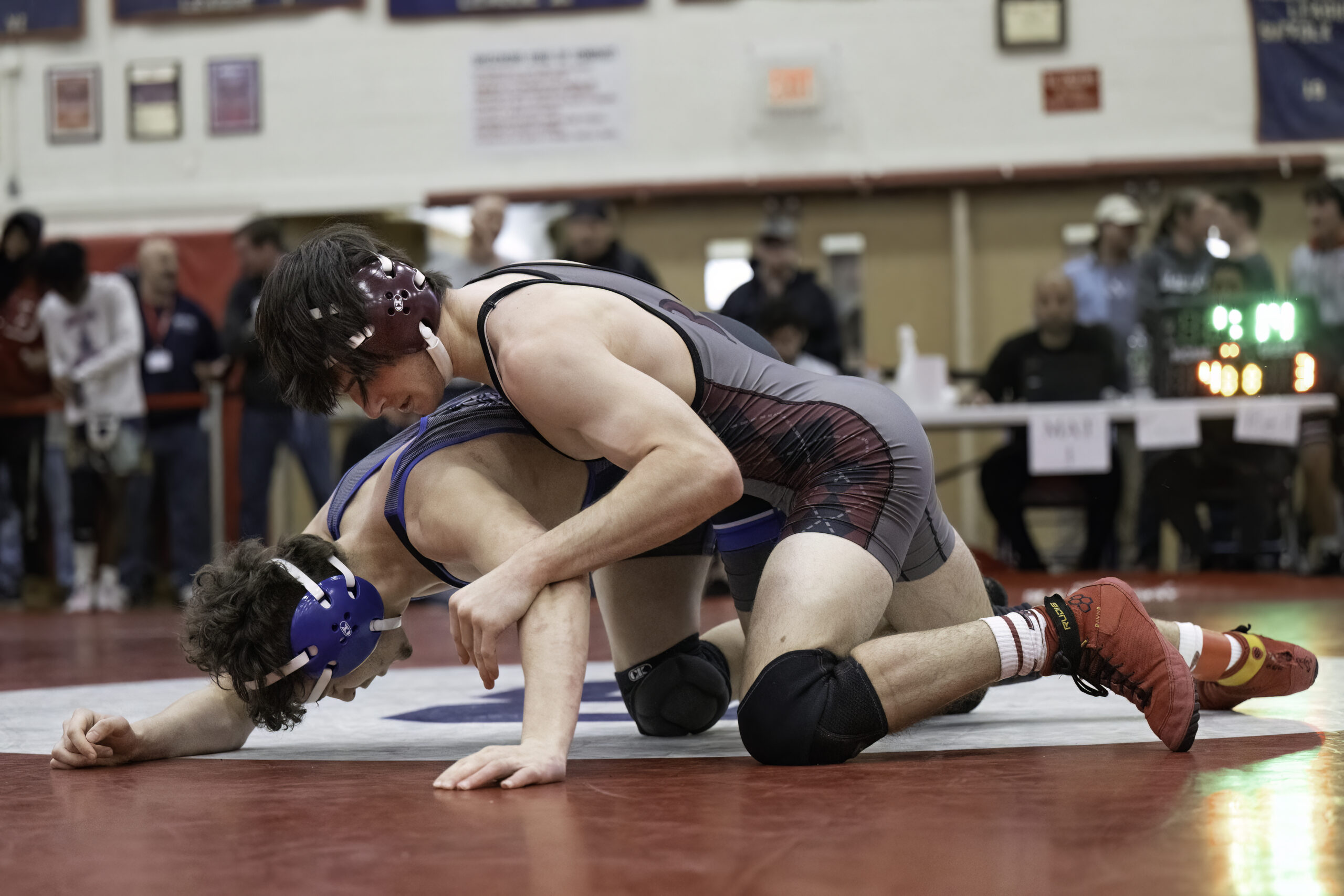 Bonacker Cooper Ceva looks for an opening on North Babylon's Ramazan Dumlupinar.   MARIANNE BARNETT
