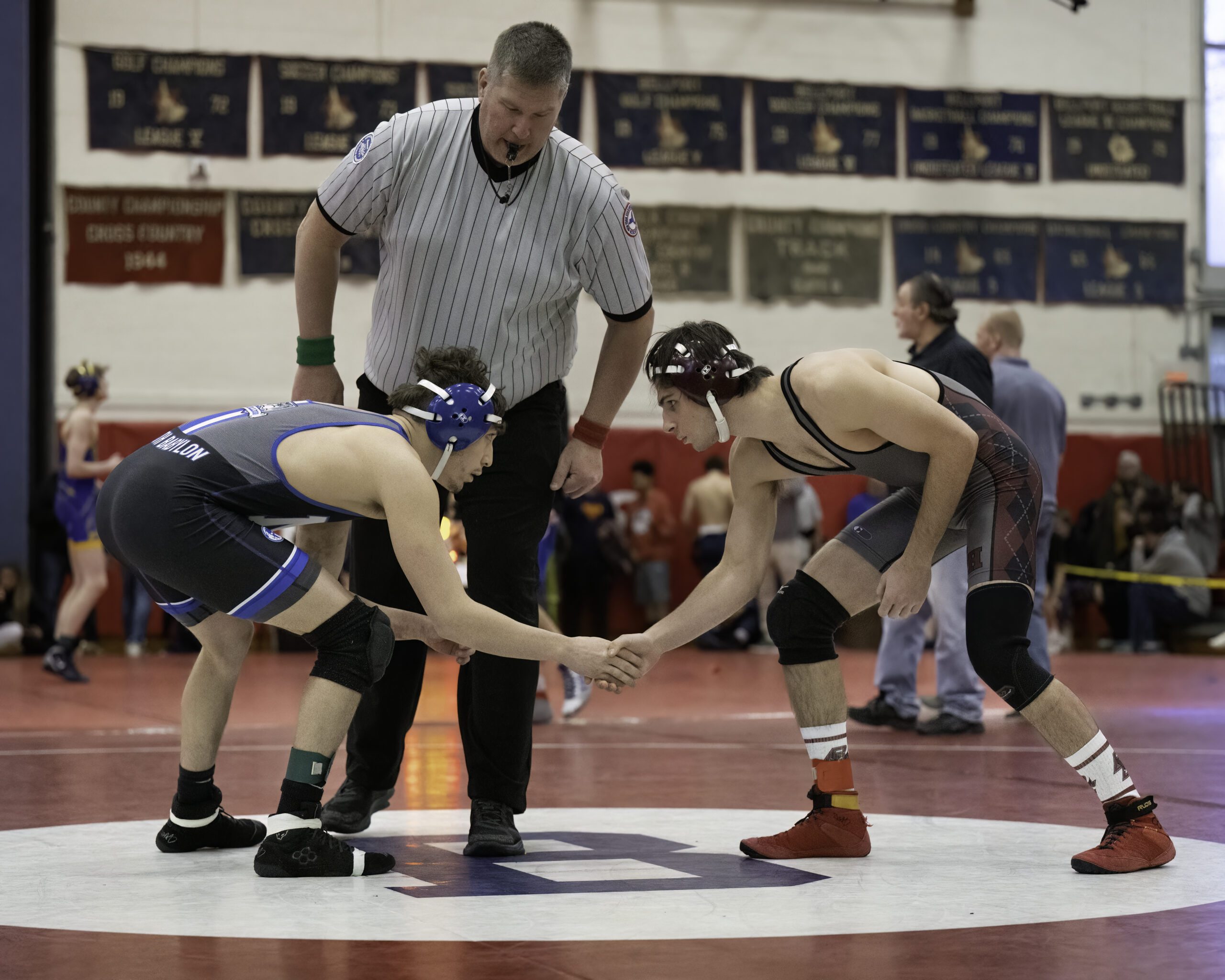 Bonacker Cooper Ceva faces off against North Babylon's Ramazan Dumlupinar in the league semifinals.    MARIANNE BARNETT
