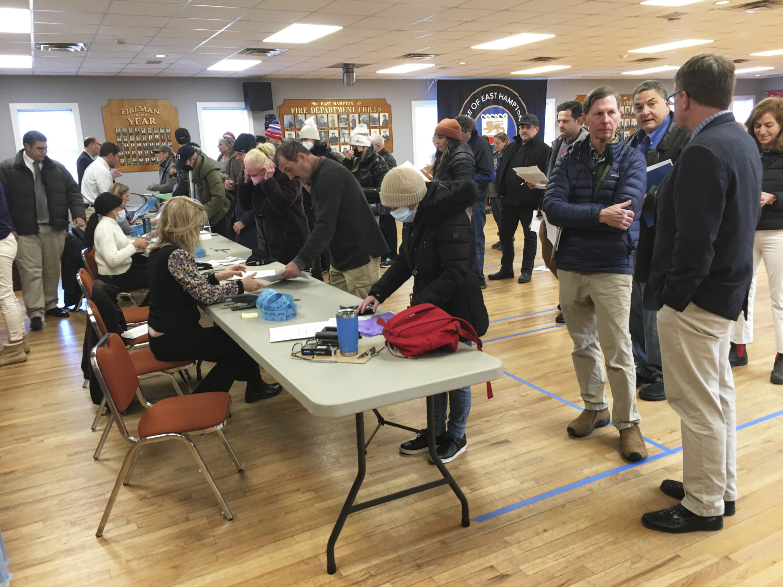 More than 1,000 local residents lined up at the East Hampton Village Emergency Services Building on Friday morning to buy a non-resident beach parking permits for the village's beaches.   RICHARD LEWIN
