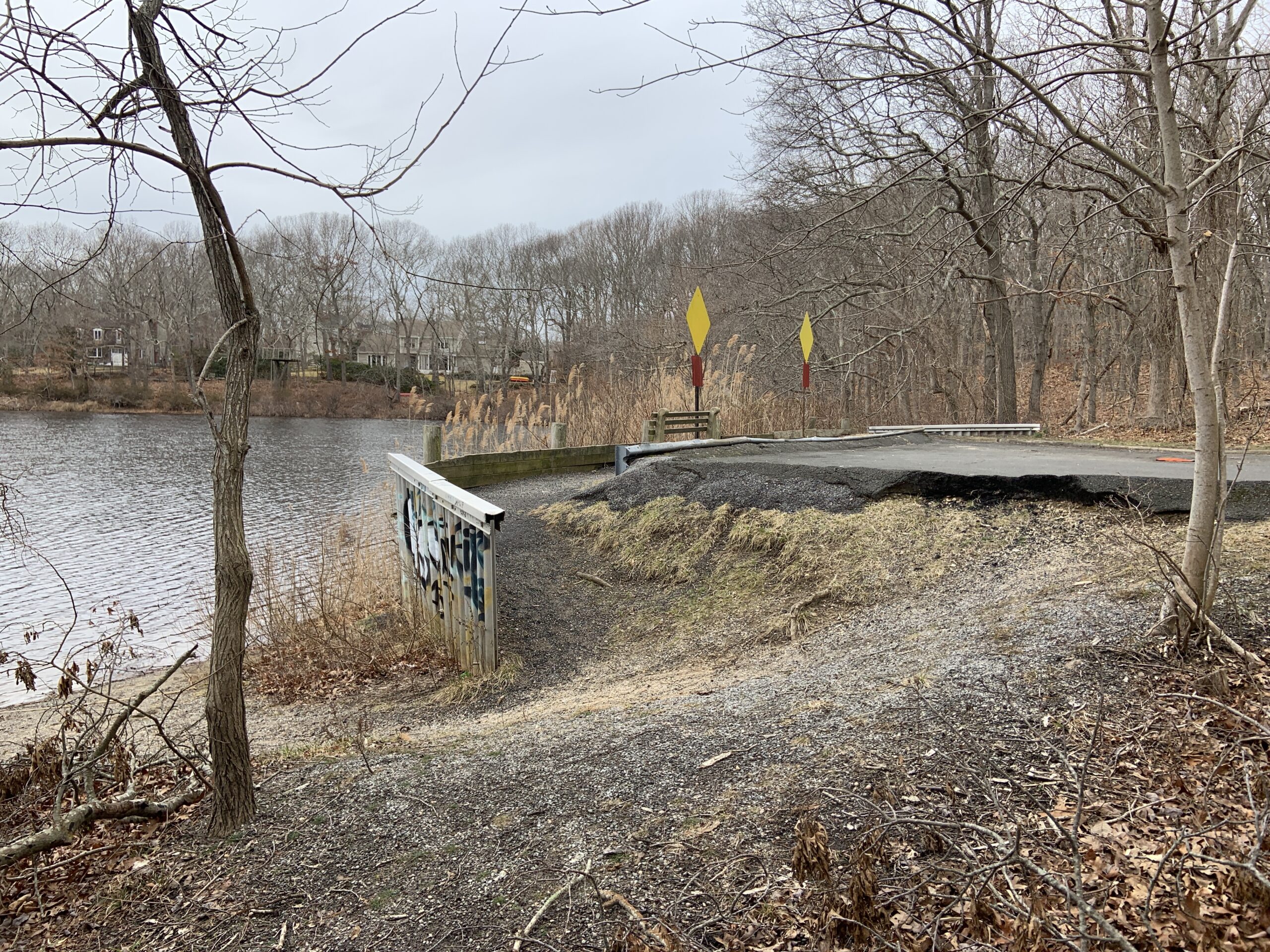 The decaying bulkhead at the foot of Middle Line Highway will be replaced with rain gardens and a bioswale in a project being coordinated by Southampton Town and the Village of Sag Harbor. STEPHEN J. KOTZ