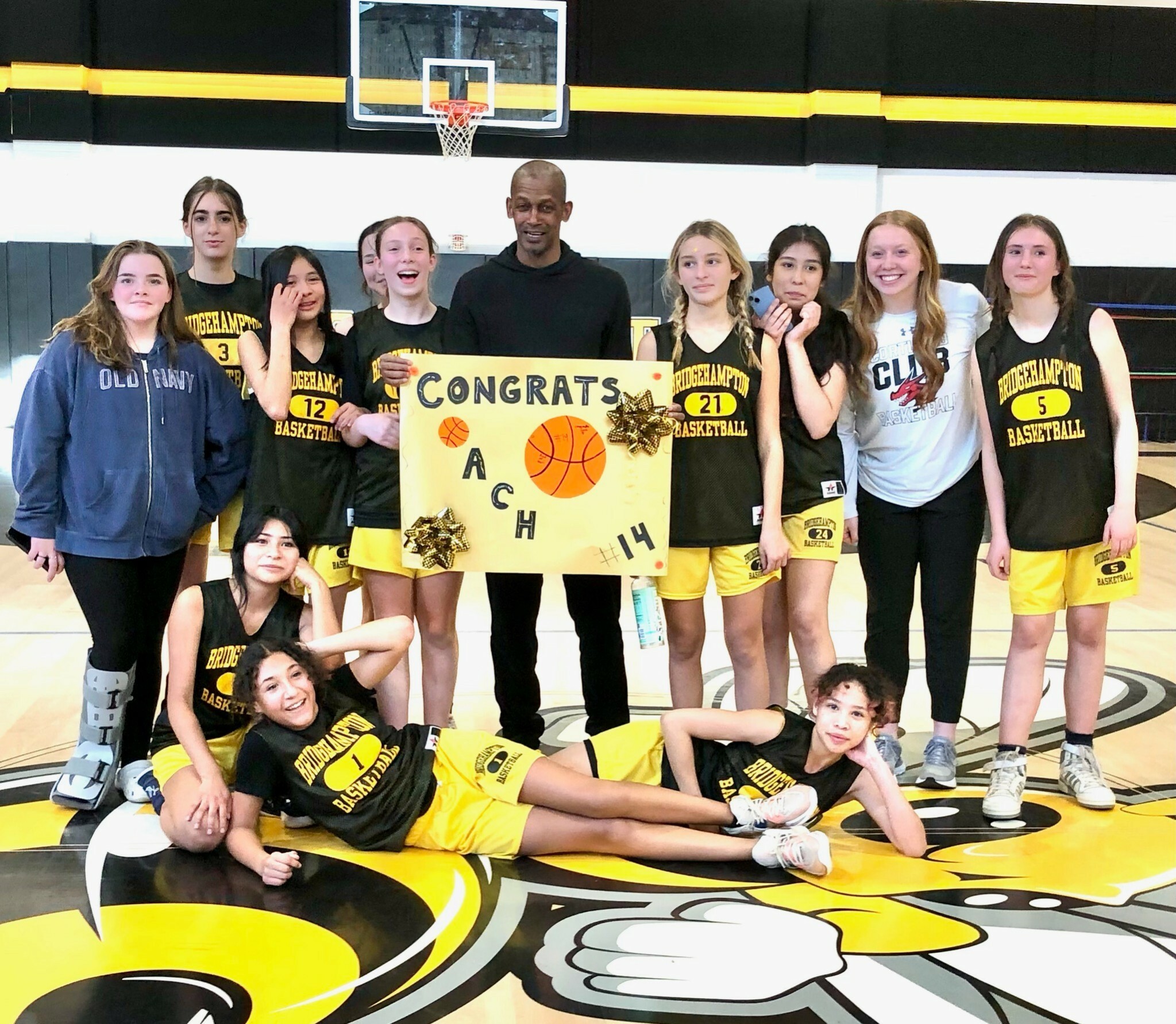 The Bridgehampton junior high girls basketball team, which Carl Johnson is the head coach of this season, congratulated him on his New York State Basketball Hall of Fame induction.