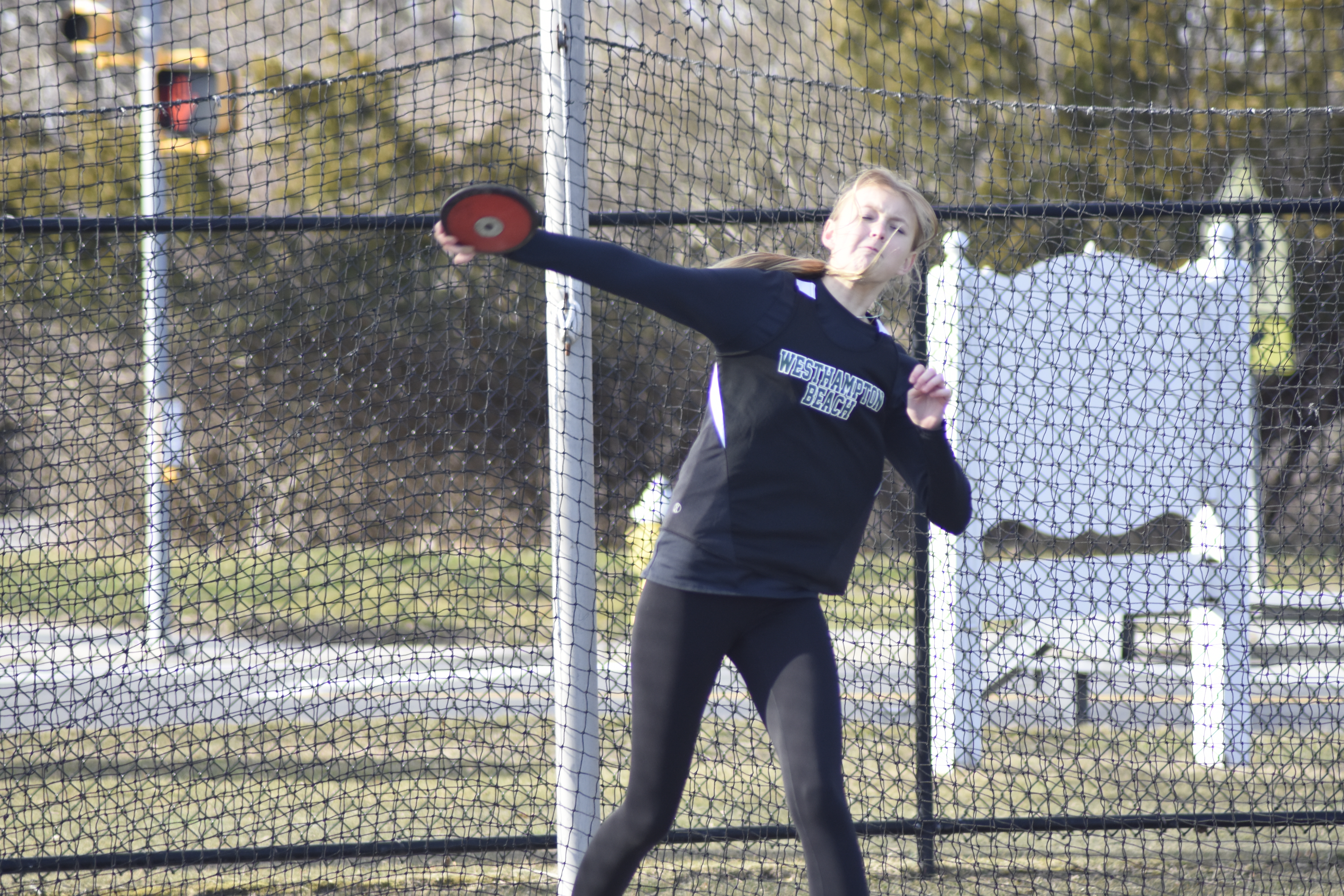 Lucy Mansfield heads up what is a strong group of throwers for the Westhampton Beach girls team this spring, something the team hasn't had in quite a while.   DREW BUDD