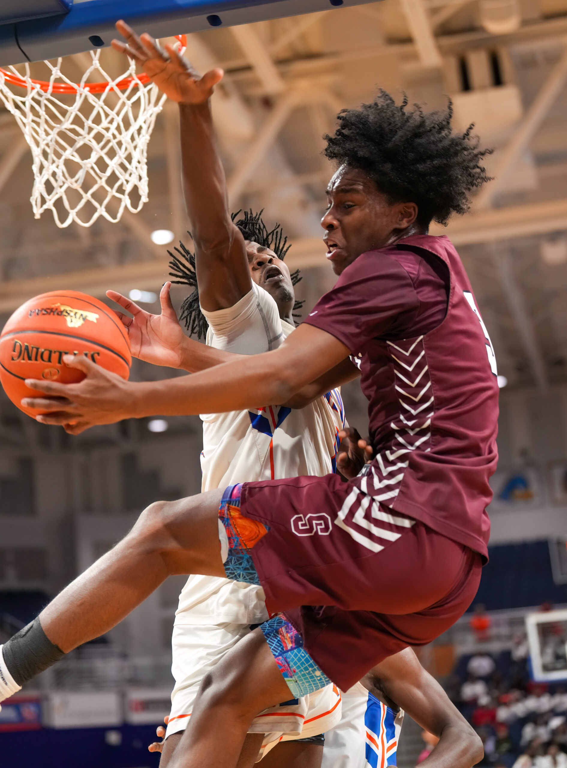 Derek Reed took a few hard hits against Malverne, one of which led to an extra free throw after an intentional foul was called.   RON ESPOSITO