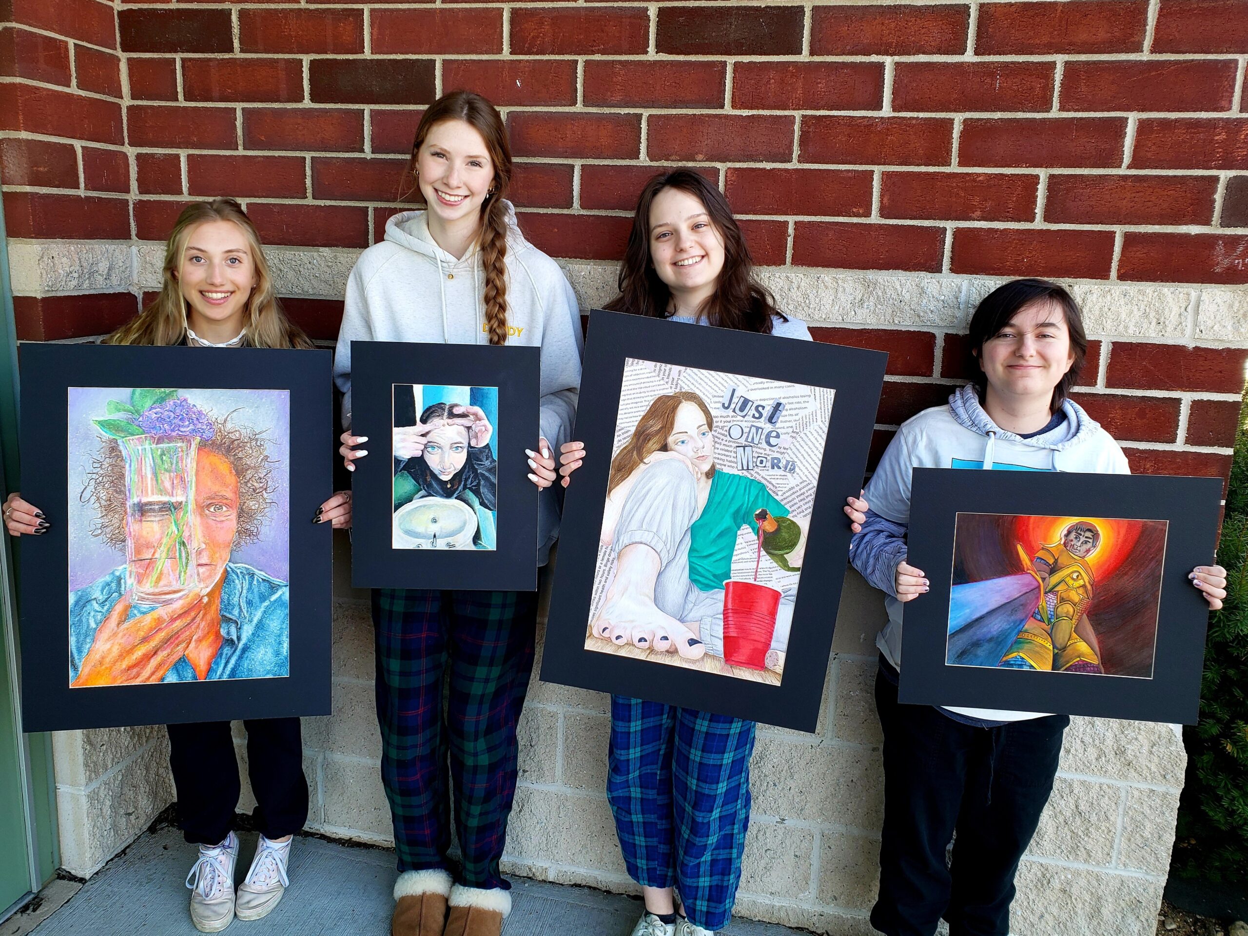 Students at Eastport-South Manor Jr.-Sr. High School, including, from left, Grace Rocchetta,
Reagan Walsh, Keira Bree and Sian Callahan, will exhibit their works at the Parrish Art Museum’s annual student exhibition. The exhibit is open until April 16. COURTESY EASTPORT-SOUTH MANOR SCHOOL DISTRICT