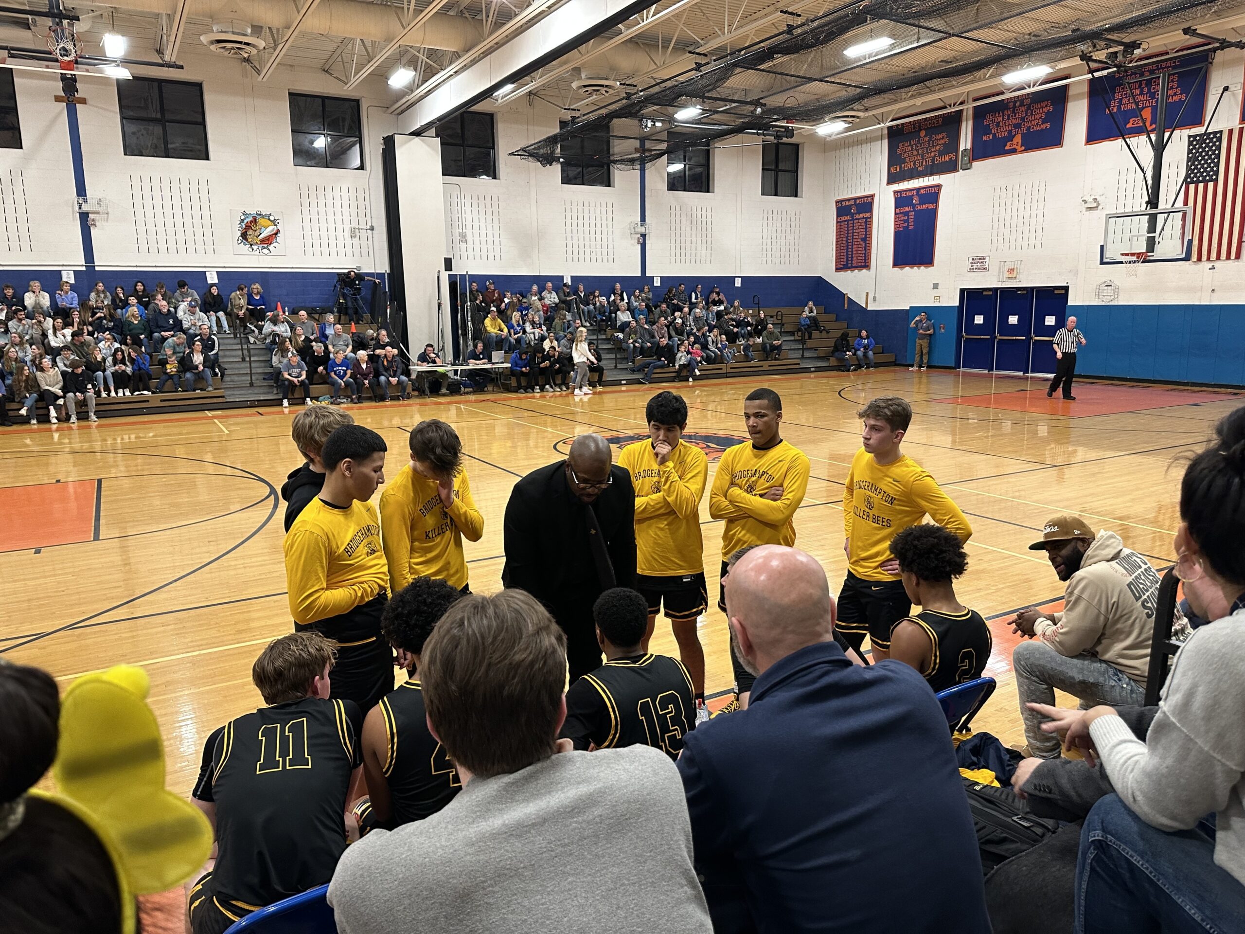 Bridgehampton head coach Ron White rallies his boys basketball team during Tuesday night's Class D regional semifinal at S. S. Seward Institute in Florida, New York. SUSAN CONKLIN