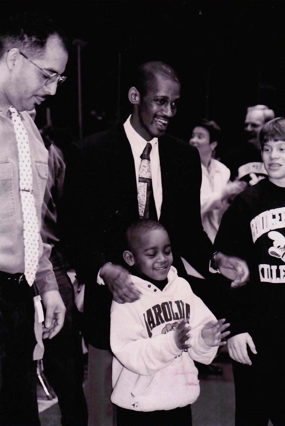 Carl Johnson with his son Davin and Chris Contrall over 25 years ago.