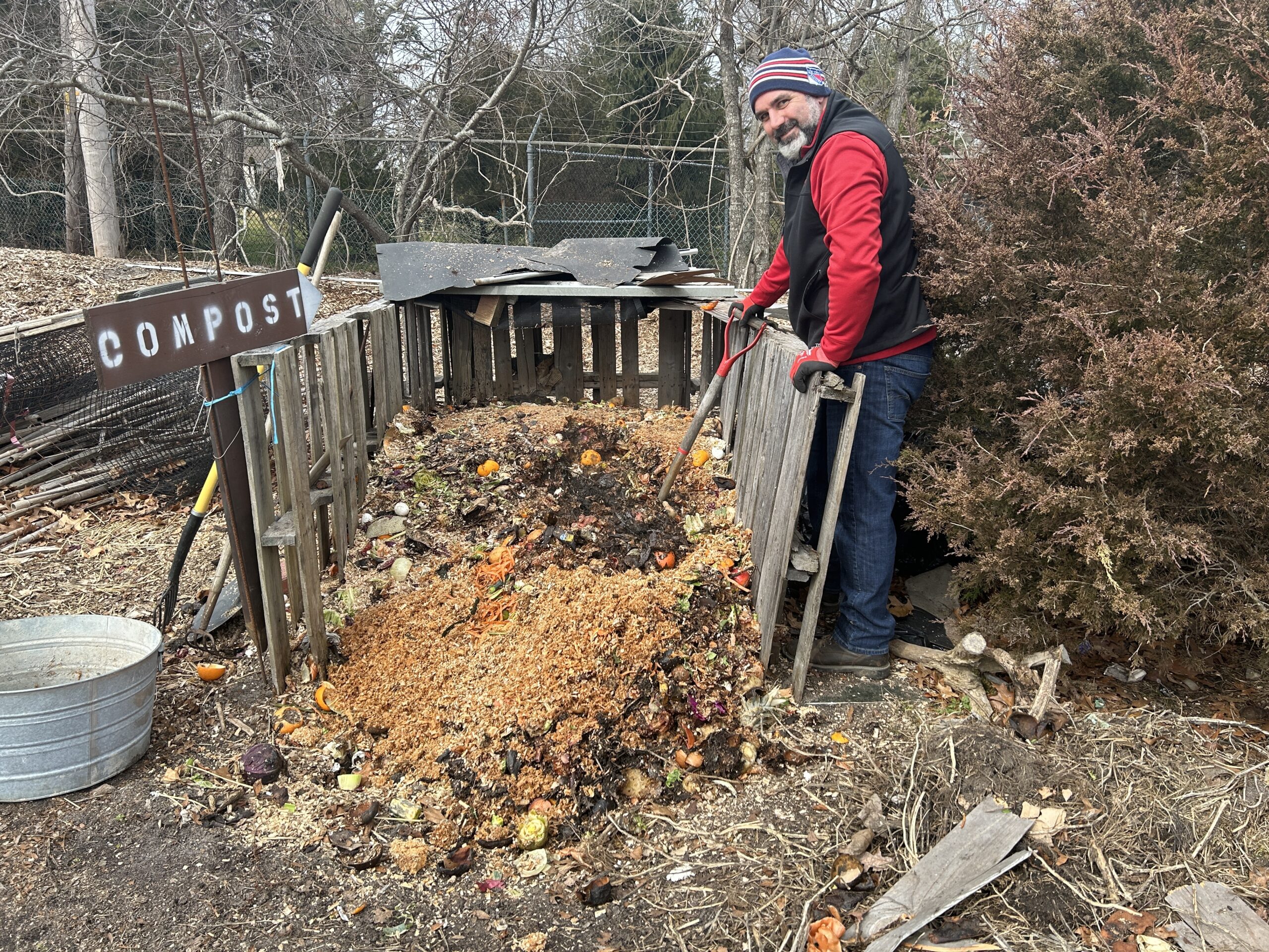 Tony Romano of the Ecological Cultural Initiative offered a tour of its community compost project at St. Joseph Villas in Hampton Bays. Above,  a collection bin.    KITTY MERRILL