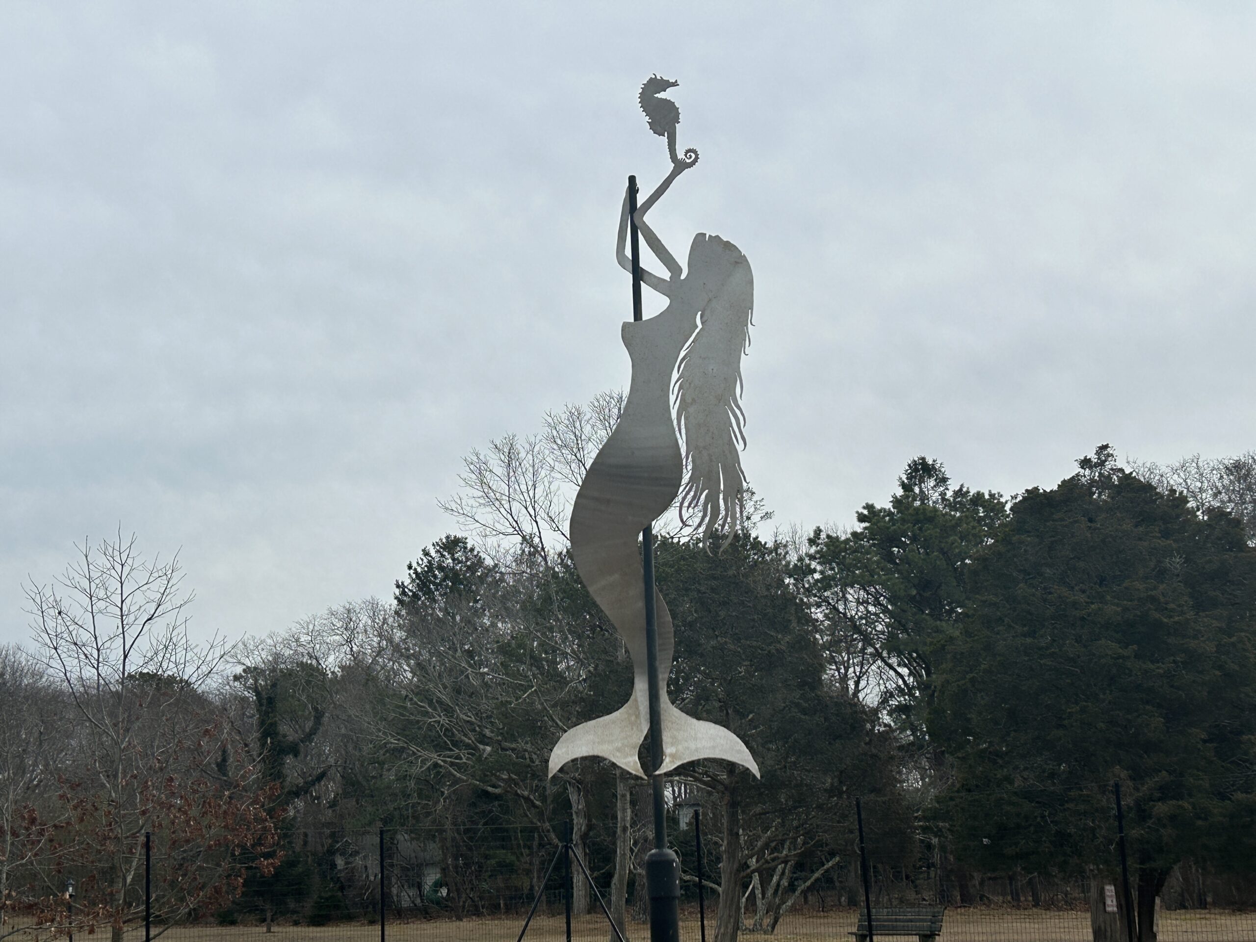 Kinetic sculptures , including two mermaid sisters, adorn the Ecological Cultural Initiative site.    KITTY MERRILL