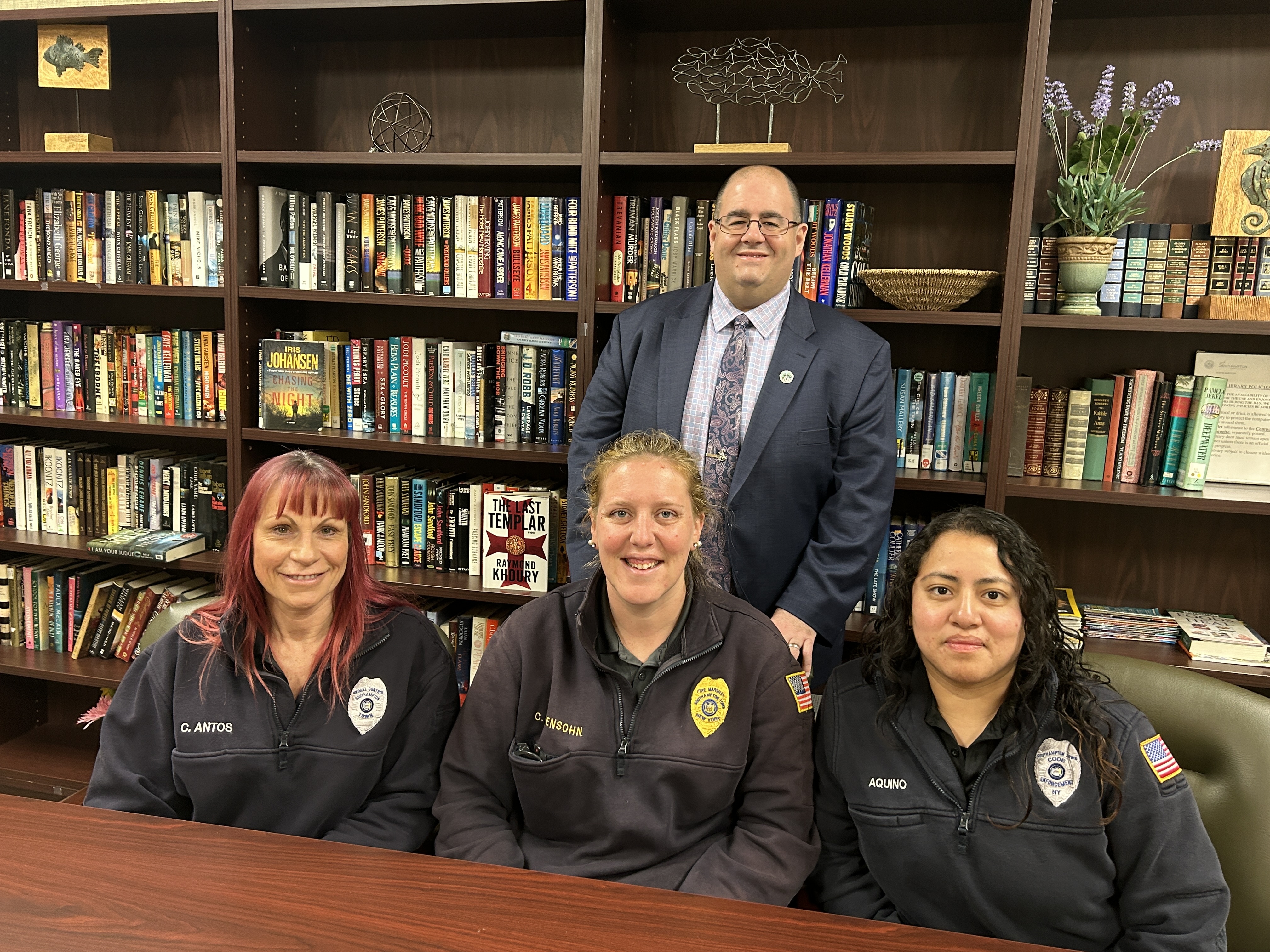 Public safety administrator Ryan Murphy with (from left) animal control supervisor Cathy Antos, fire marshal Courtney Idtensohn, and code enforcement officer Eva Aquino.   KITTY MERRILL