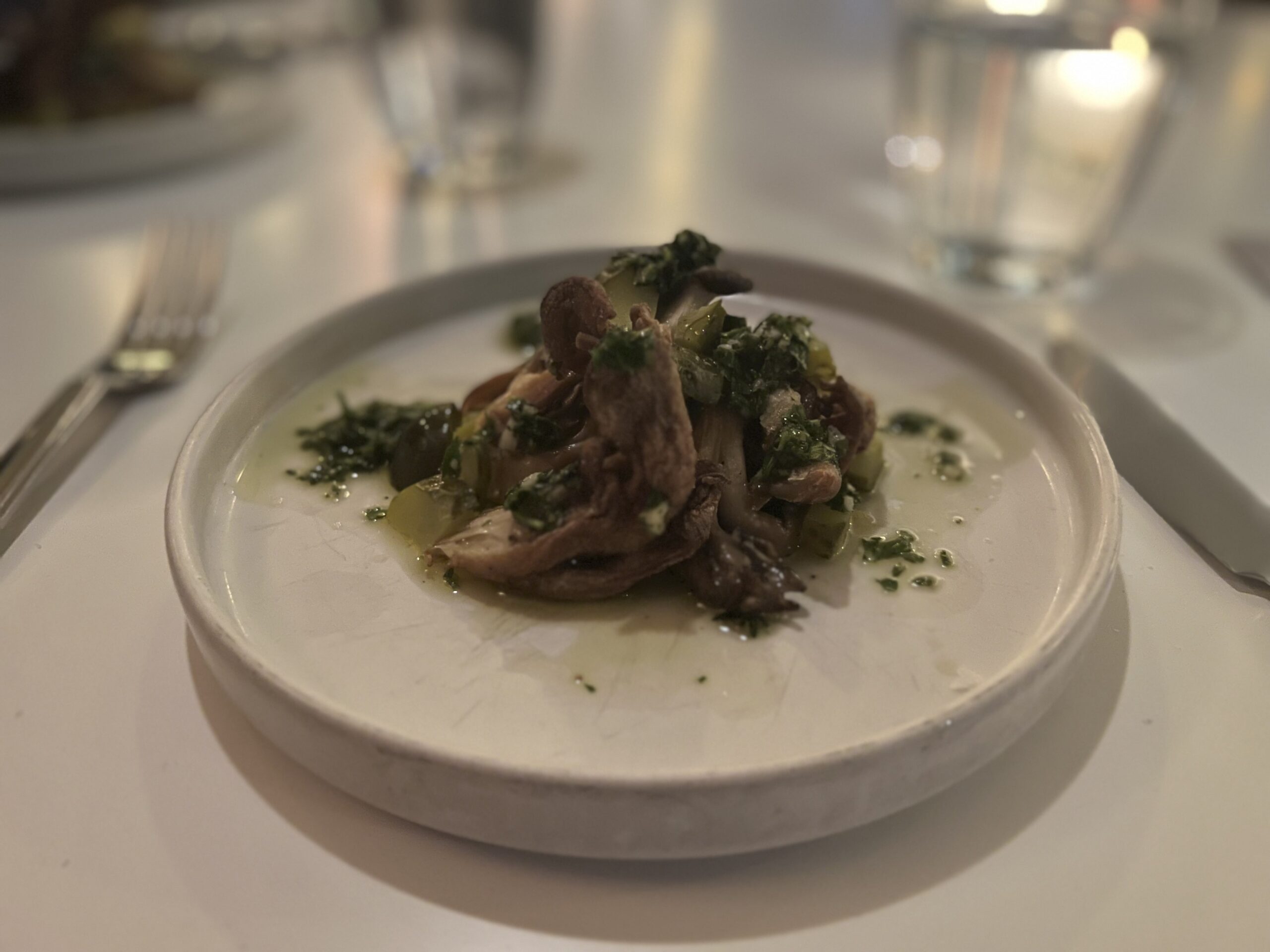 Chef Dominick Lee's crispy maitake mushrooms with sauce persillade and dill pickles. ELIZABETH VESPE