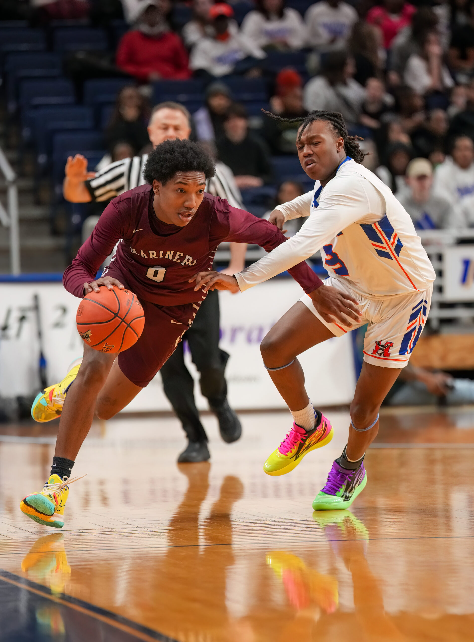 Southampton sophomore Naevon Williams drives past Malverne junior Chad Wesley.    RON ESPOSITO