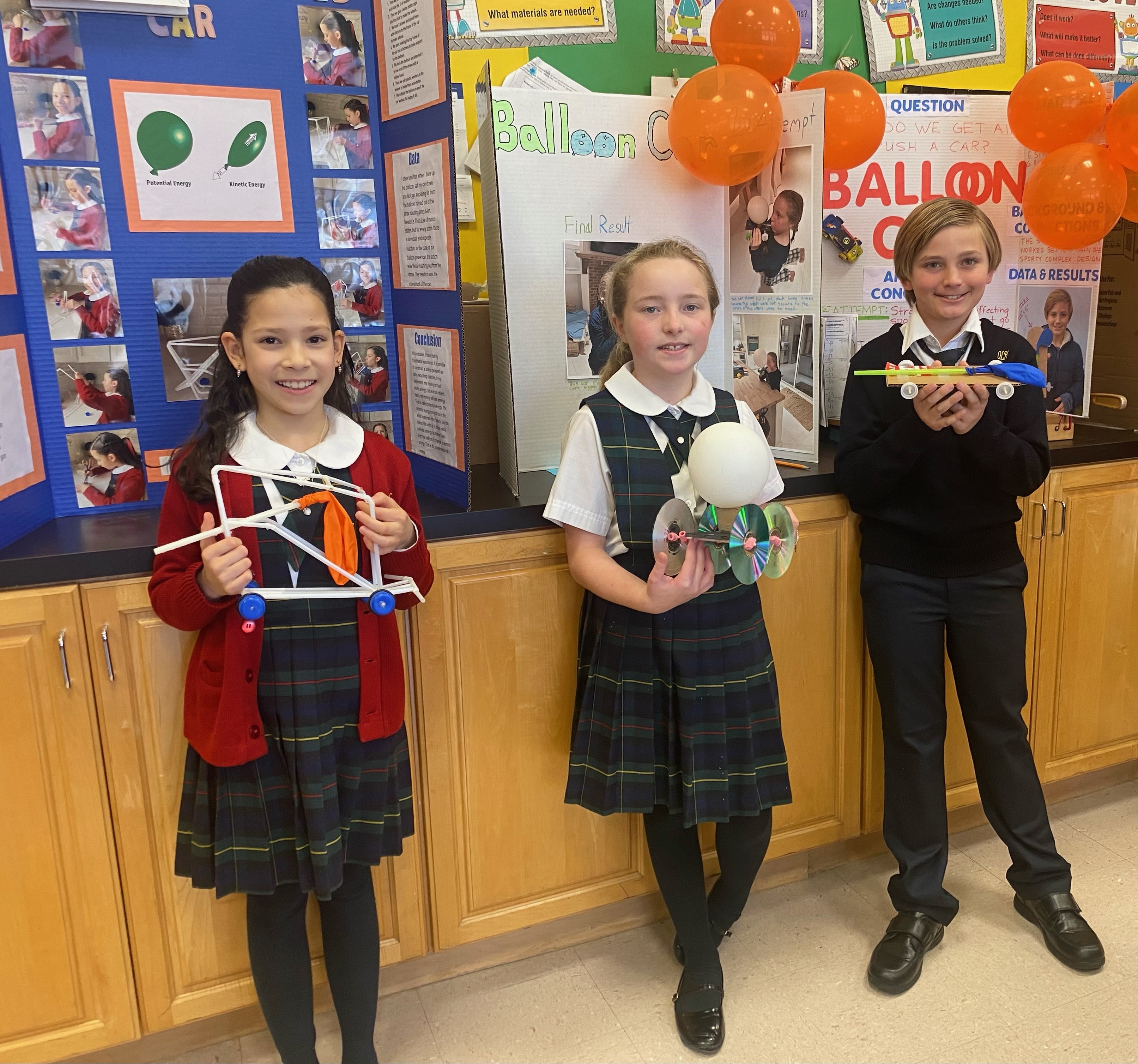 Our Lady of the Hamptons School recently held various science competitions. In fifth grade, from left, Cooper Beaton, Jaden Hoffert and Amelia Witkowski were the winners of a STEAM competition. COURTESY OUR LADY OF THE HAMPTONS SCHOOL