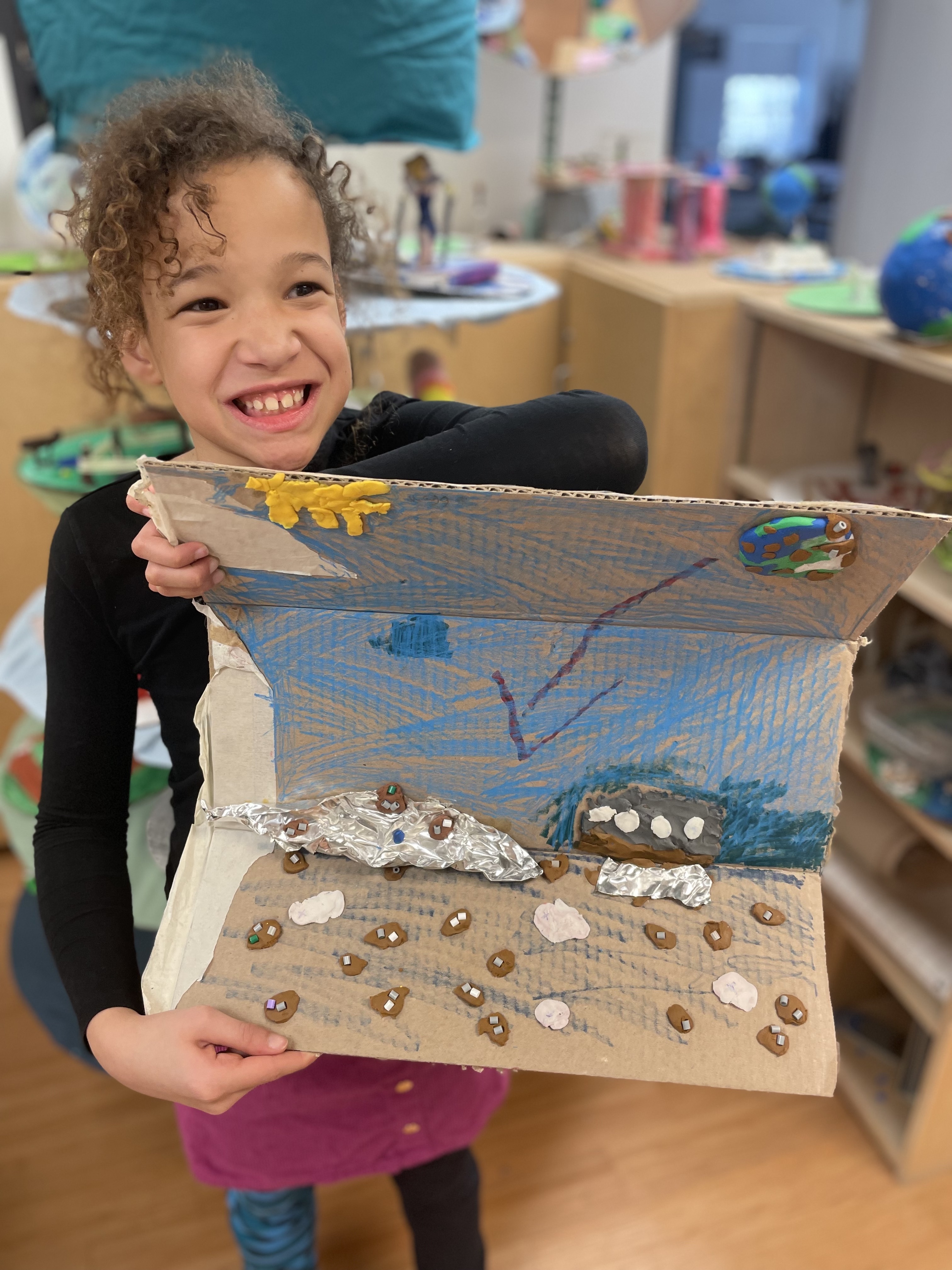 sag Harbor Elementary’s fourth grade student Maggie Moore with her art project for the Parrish Art Museum student exhibition. COURTESY SAG HARBOR SCHOOL DISTRICT