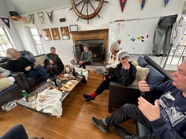 After sailing in some cold temperatures, the group likes to head back inside and enjoy some cheese, wine and a nice fire.    PAUL VOGEL