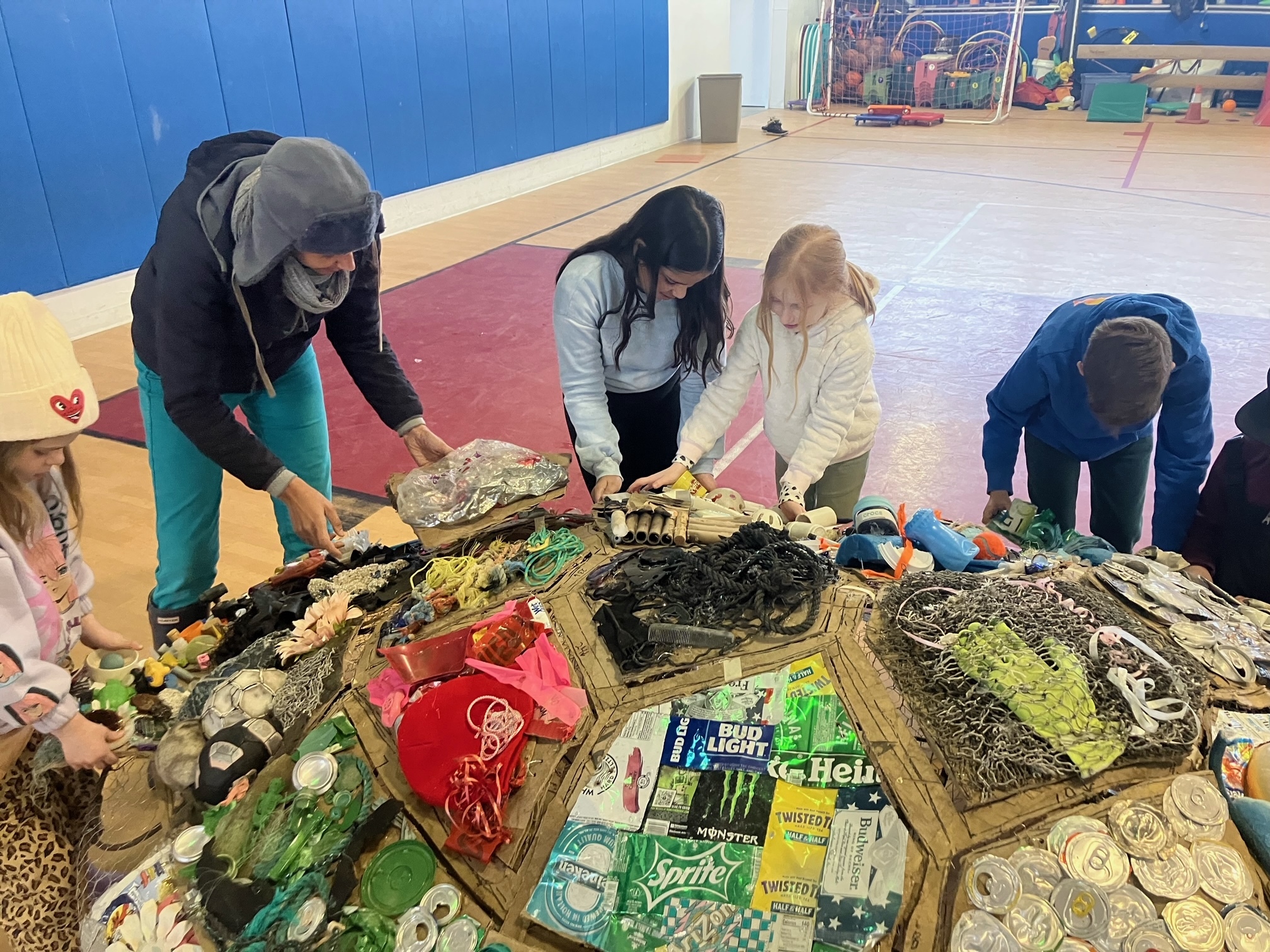 Students at the Hayground School created a sea turtle work of art, crafted from trash they collected at local beaches. It will be on display at the Parrish Art Museum on March 12.