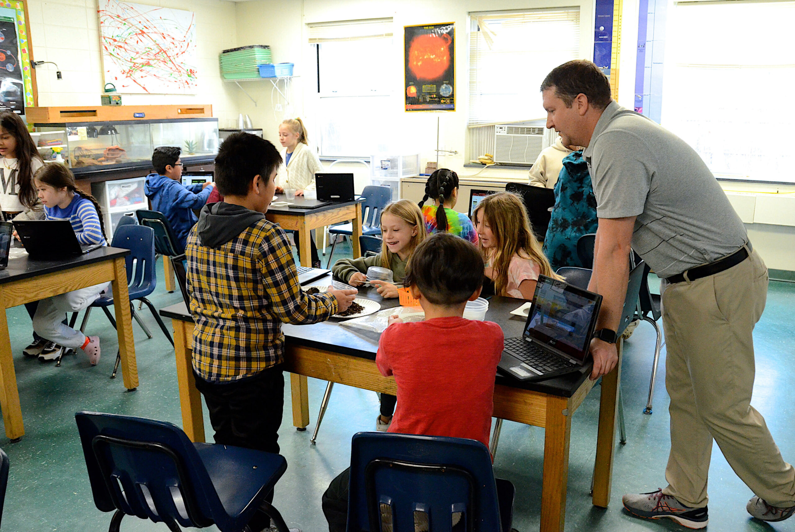 Springs School elementary science teacher Sean Knight answers students' questions. KYRIL BROMLEY