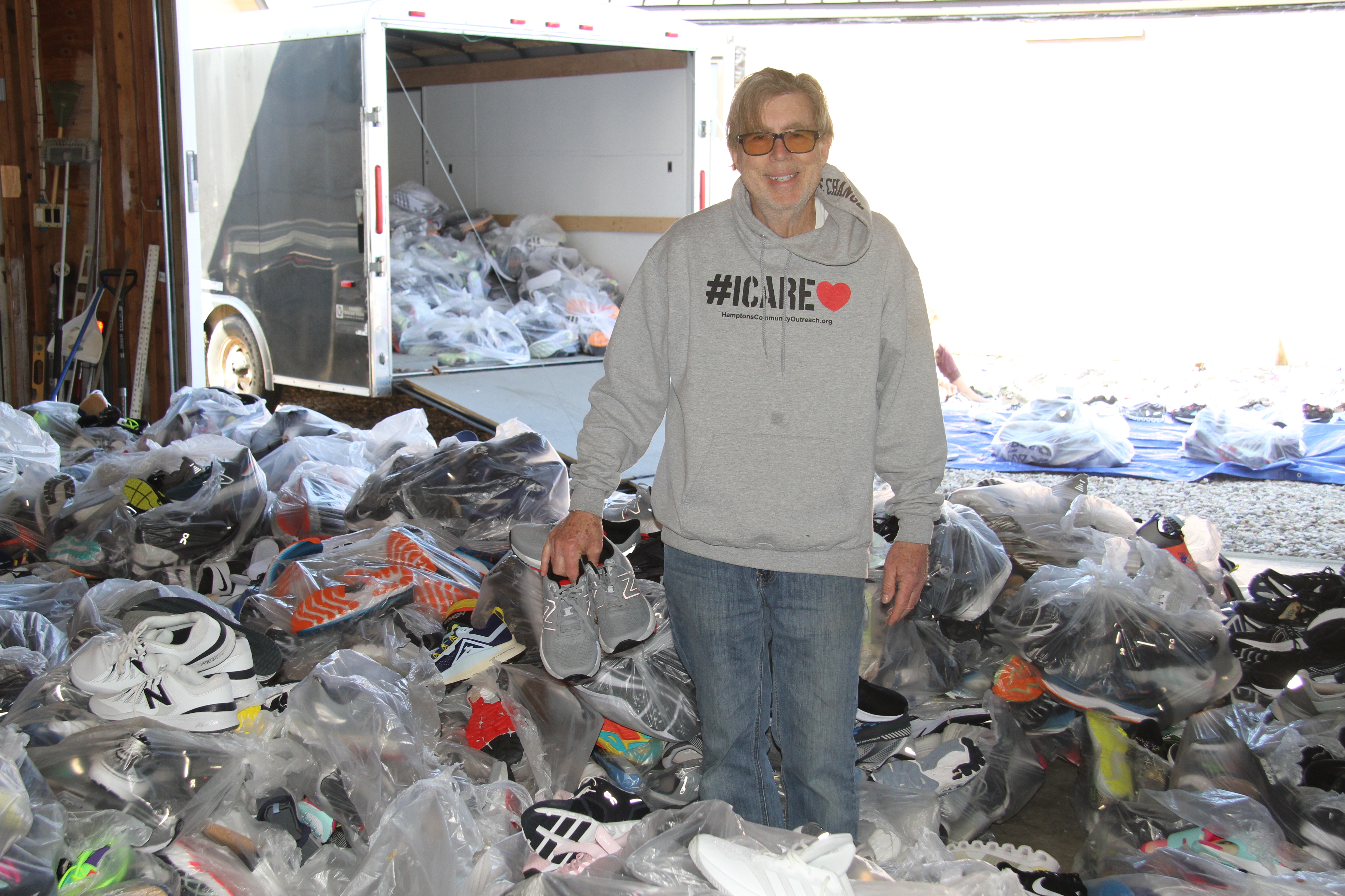 Chuck MacWhinnie is organizing the sorting of the shoes in a Southampton garage so they can be donated or sold to raise funds for charity.
MICHAEL WRIGHT