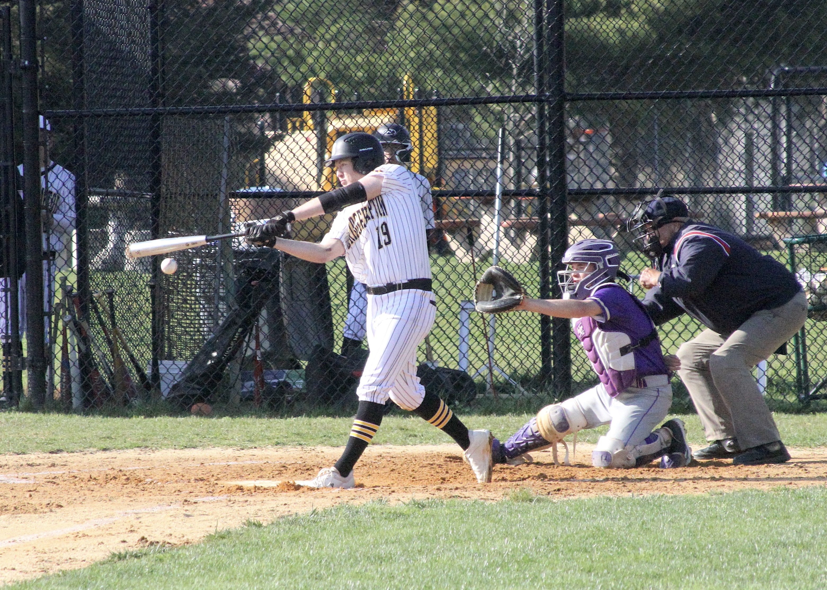 Bridgehampton senior designated hitter Jack Boeshore connects with a pitch. DESIRÉE KEEGAN