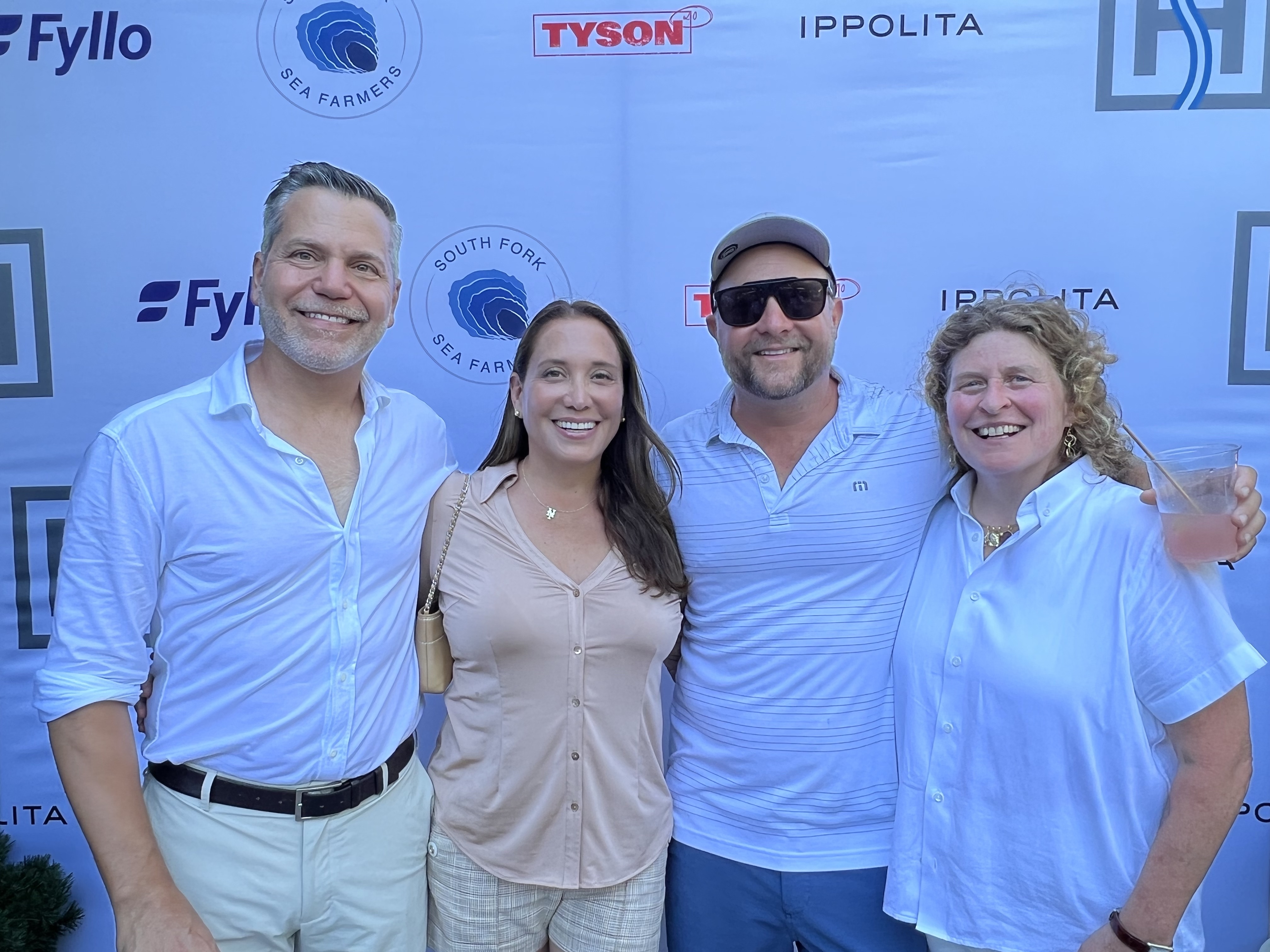 New York Mets owner Alex Cohen, second from left, with Kurt Giehl, left, and South Fork Sea Farmers board members Jeff Ragovin and Alina Lundry.