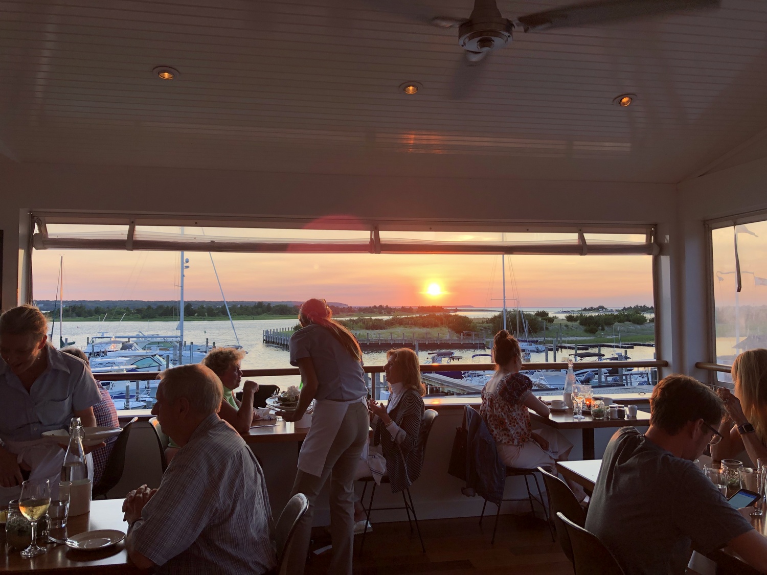 The sunset view at Bostwick's on the Harbor. COURTESY BOSTWICK'S ON THE HARBOR