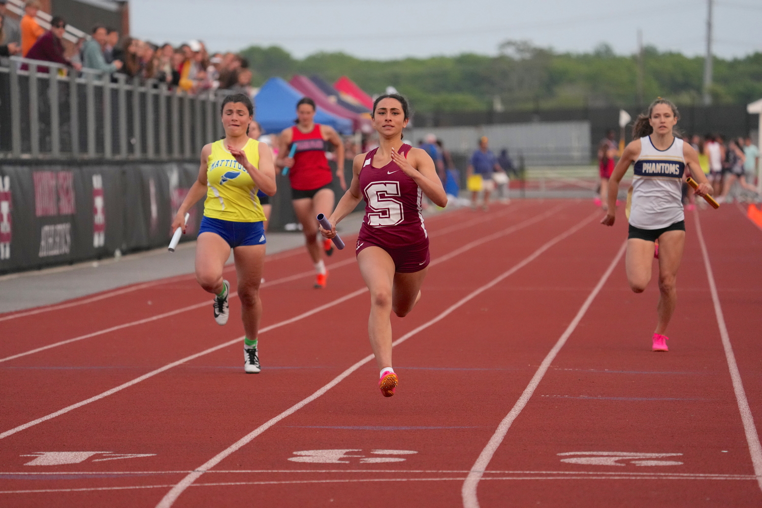 Southampton's Kyla Cerullo brings home the win in the 4x100-meter relay on Monday.   RON ESPOSITO