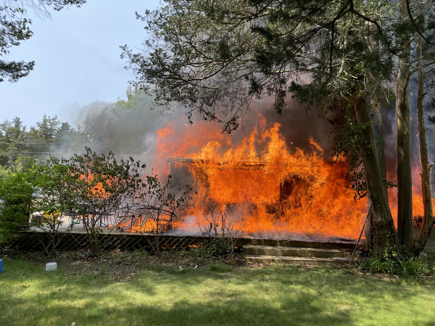 Flames consumed a home on Shore Road in Remsenburg on May 24.   COURTESY EASTPORT FIRE DEPARTMENT