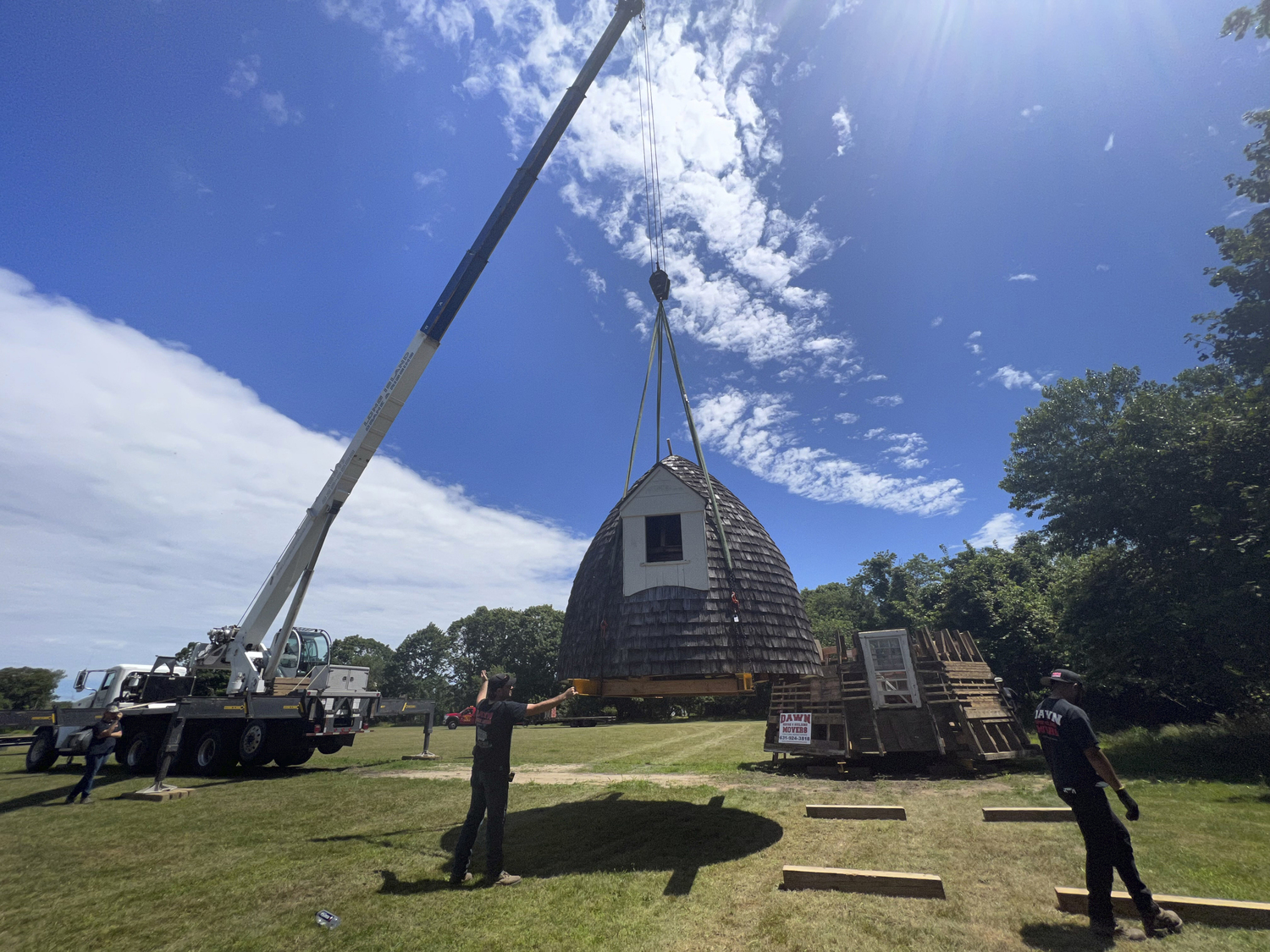 The Dix Windmill was disassembled and moved to the Great Lawn for storage in July 2022. FILE PHOTO