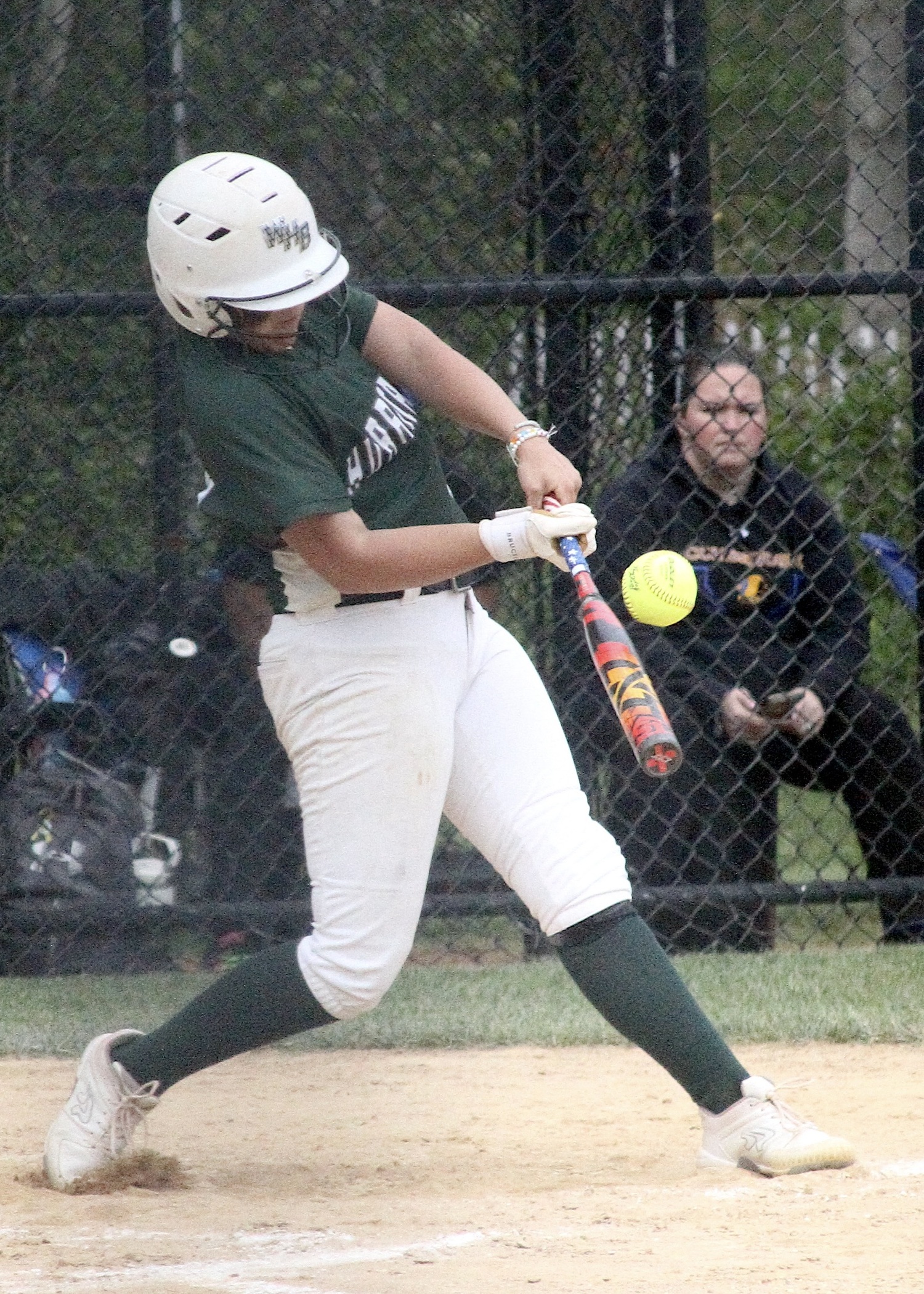 Freshman pitcher Addison Celi connect with a pitch. DESIRÉE KEEGAN