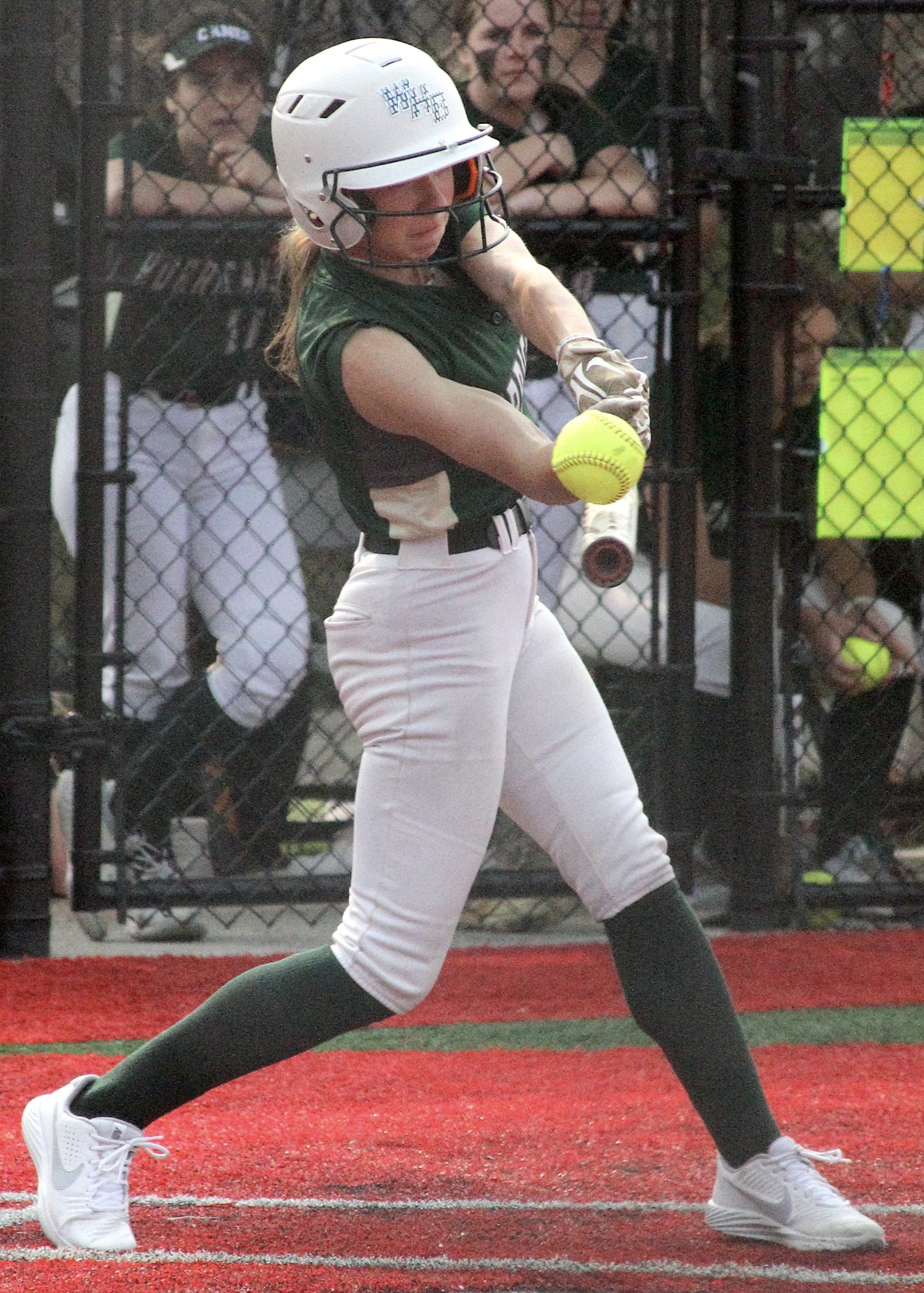 Junior left fielder Ashley Erbis connects with a pitch. DESIRÉE KEEGAN
