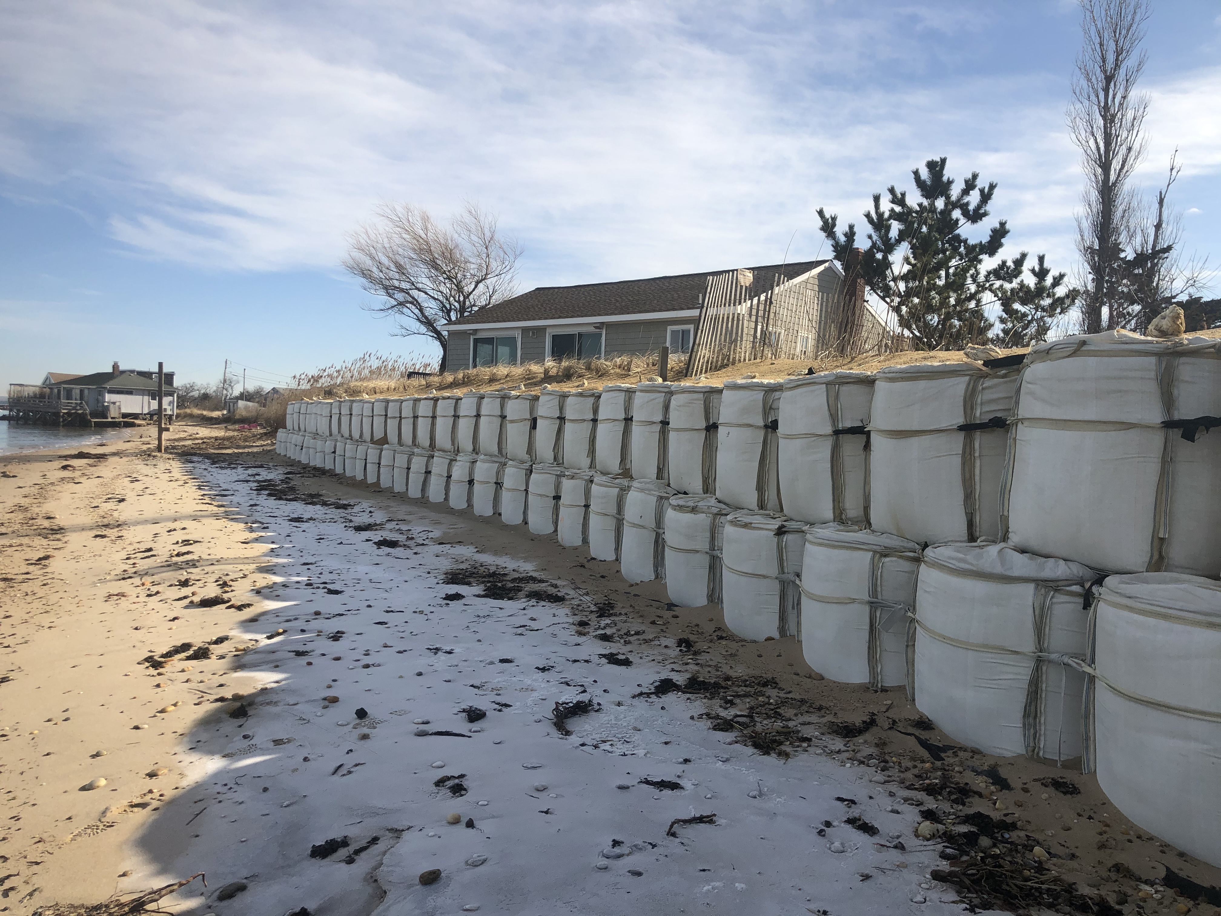 A wall of 1-ton sandbags called GeoCubes across two the front of two properties on Bay View Avenue in Amagansett, near Lazy Point, was supposed to be temporary, in place for no more than 9 months, when it was installed a decade ago.
MICHAEL WRIGHT