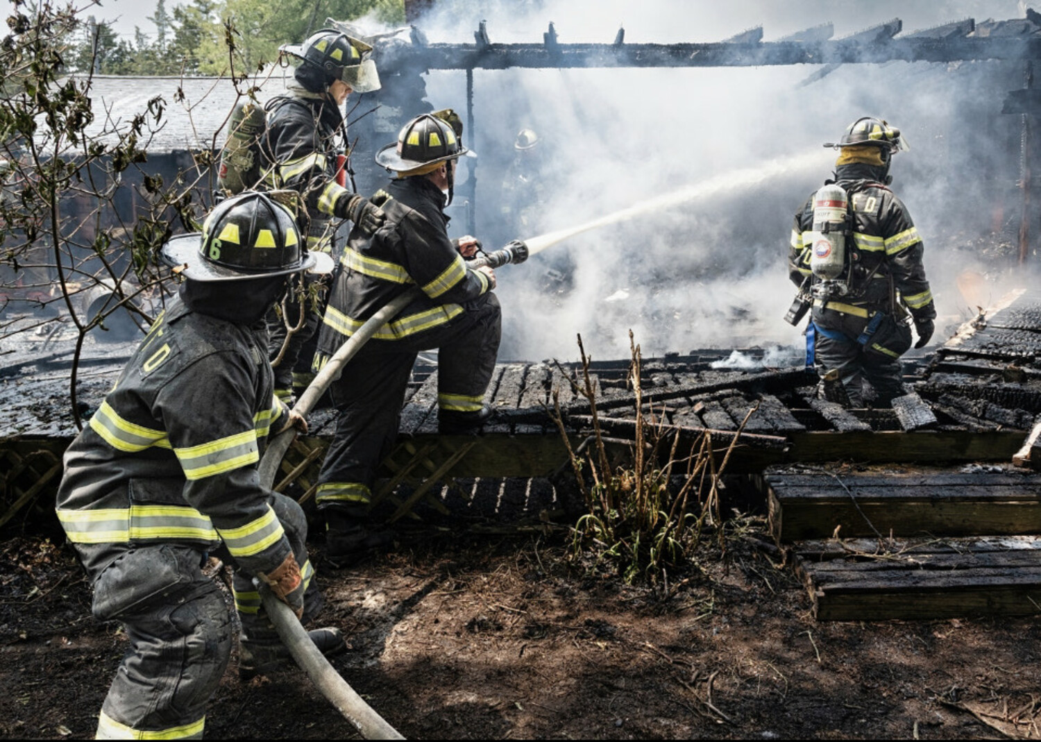 Over 100 firefighters battled the Shore Road, Remsenburg, fire on May 24.   COURTESY EASTPORT FIRE DEPARTMENT